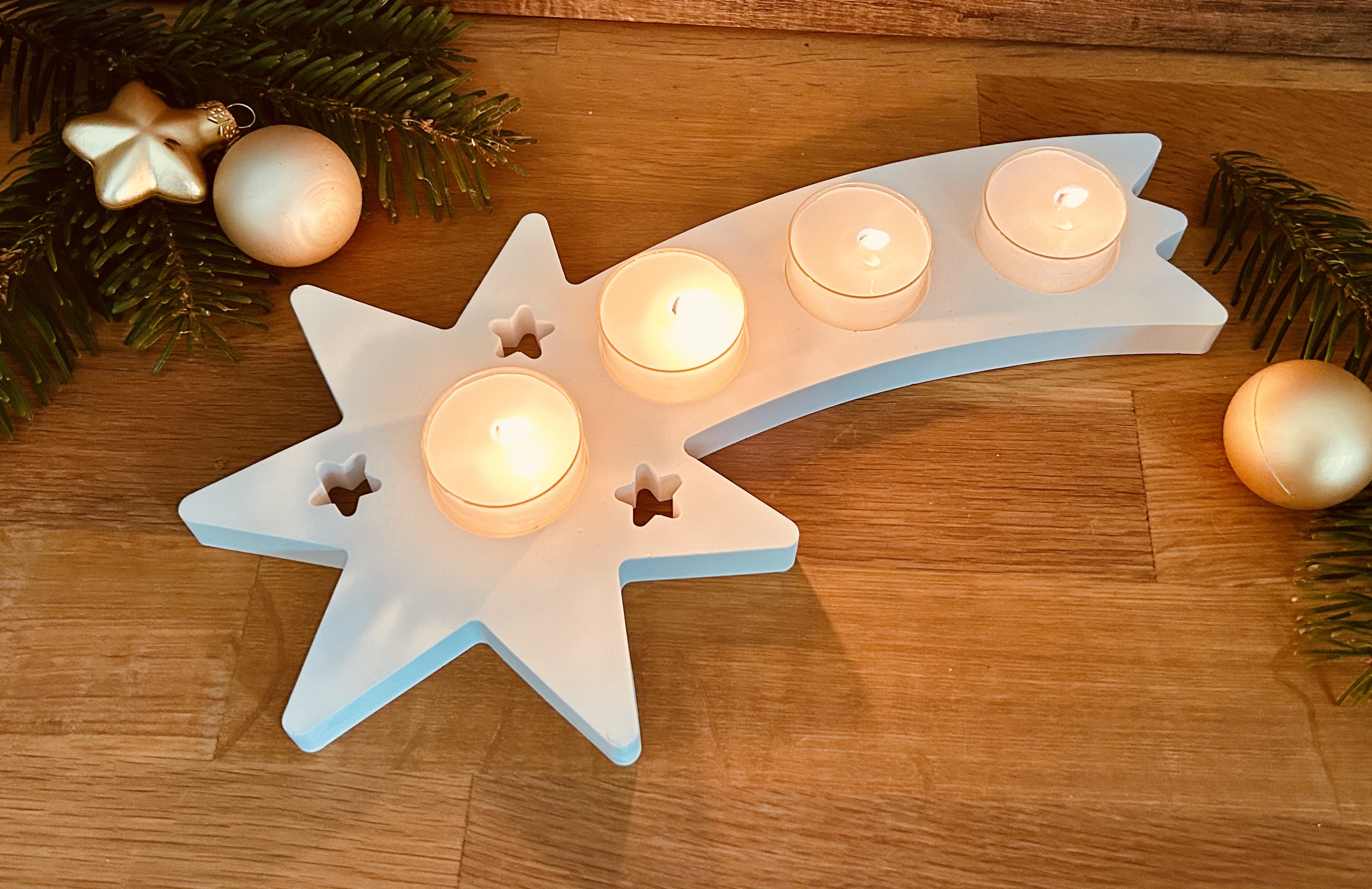 Kerzenhalter in Sternschnuppenform