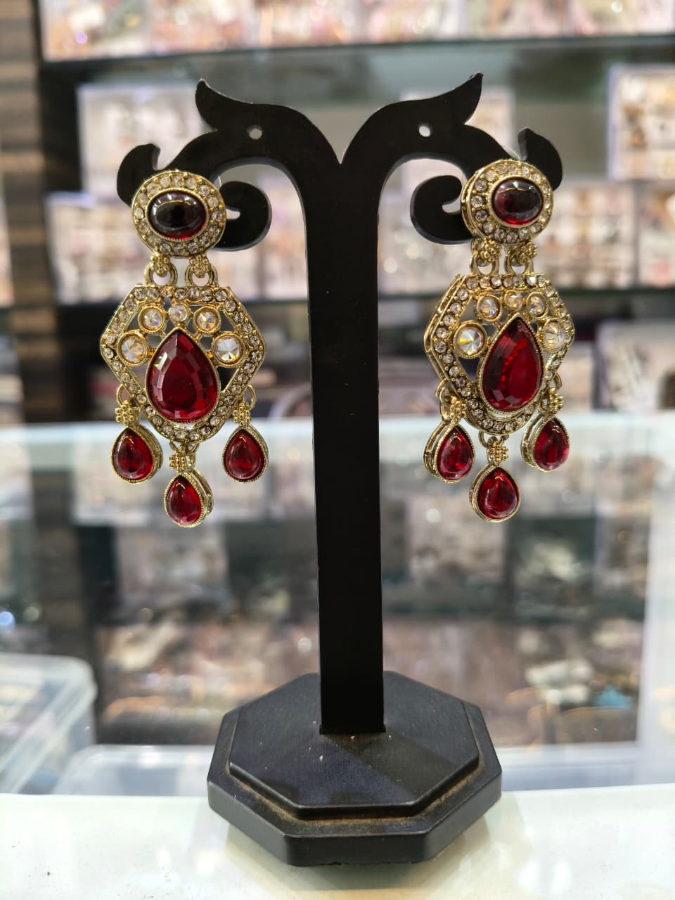 Red and gold statement earrings