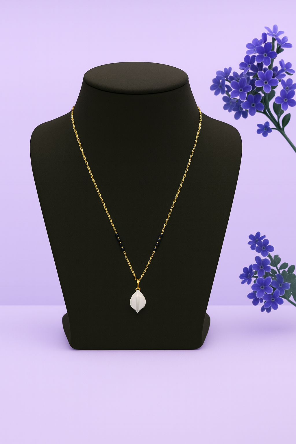 Elegant Gold Necklace with White Petal Pendant