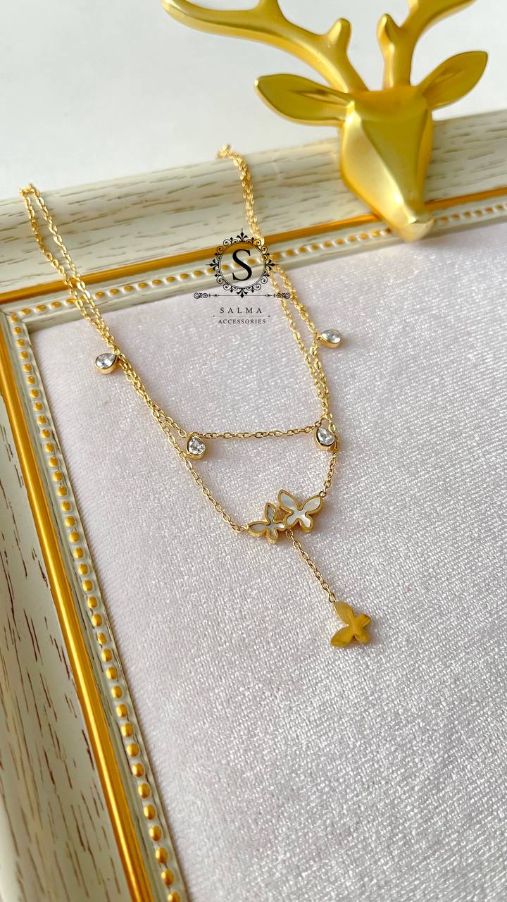 white butterfly anklet