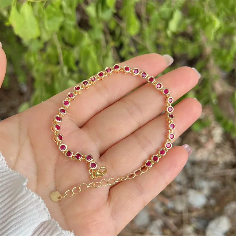Elegant Gold-Plated Bracelet with Red Stones