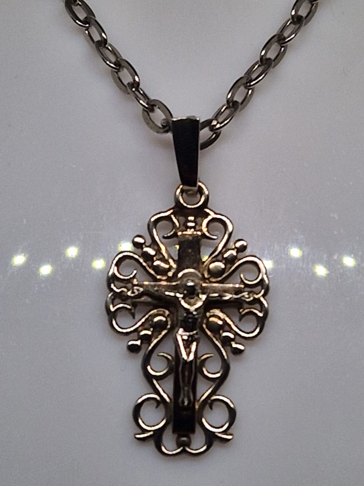 Silver Cross with a Beautiful Curl Ornament
