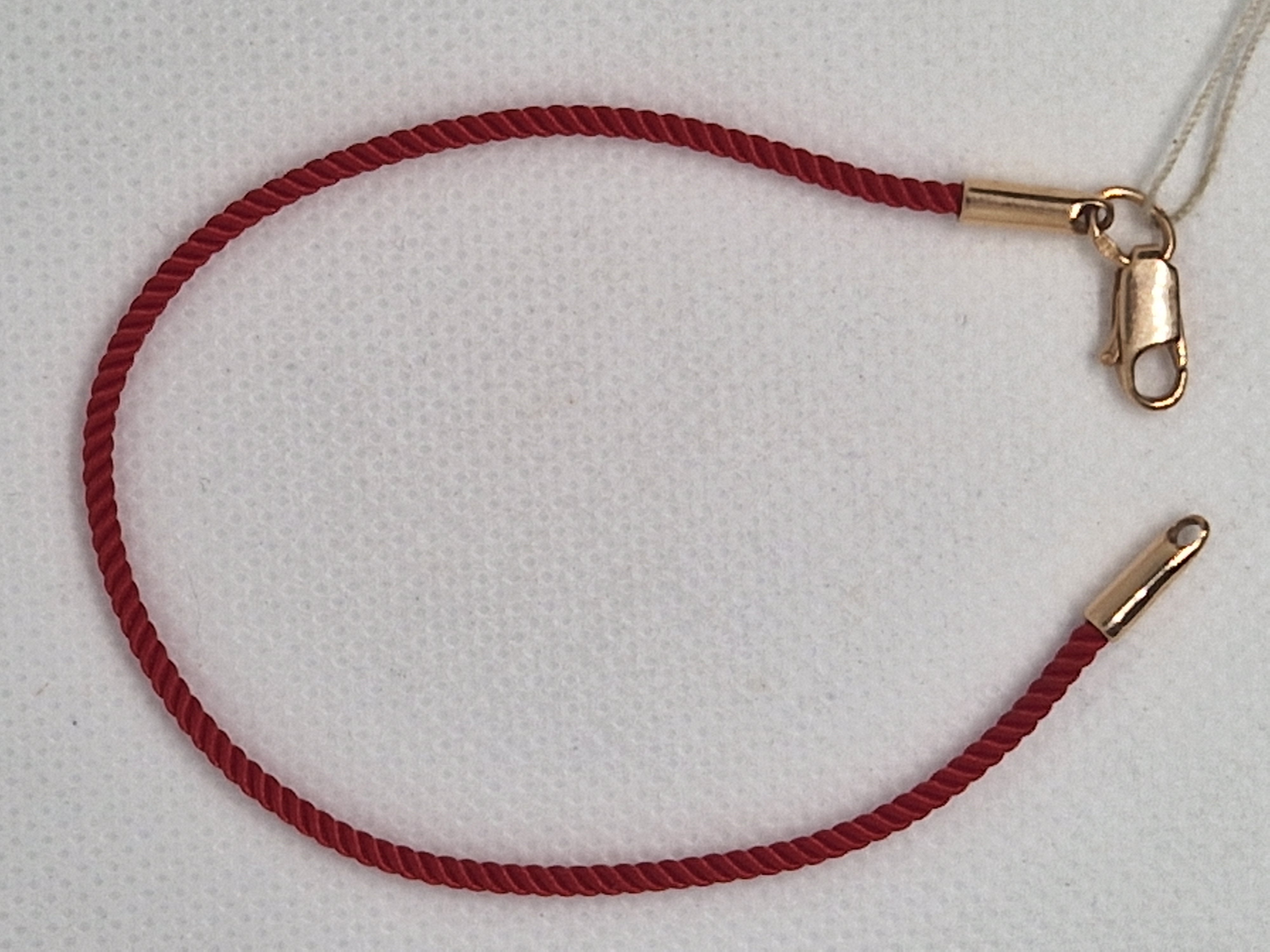 Red Rope Bracelet with gold ends and a lock