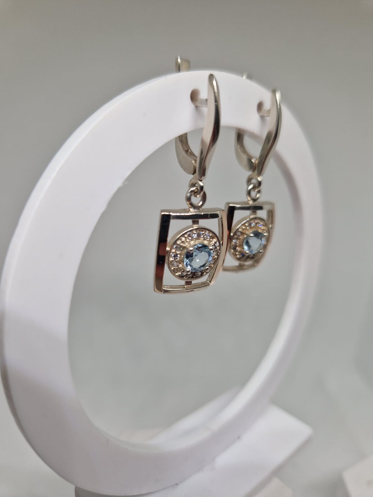Silver & Golden Earrings with a Topaz, Cubic Zirconia inlay