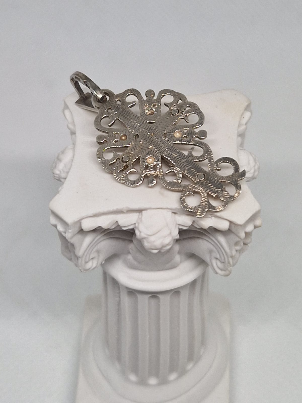 Silver Cross with a Beautiful Curl Ornament