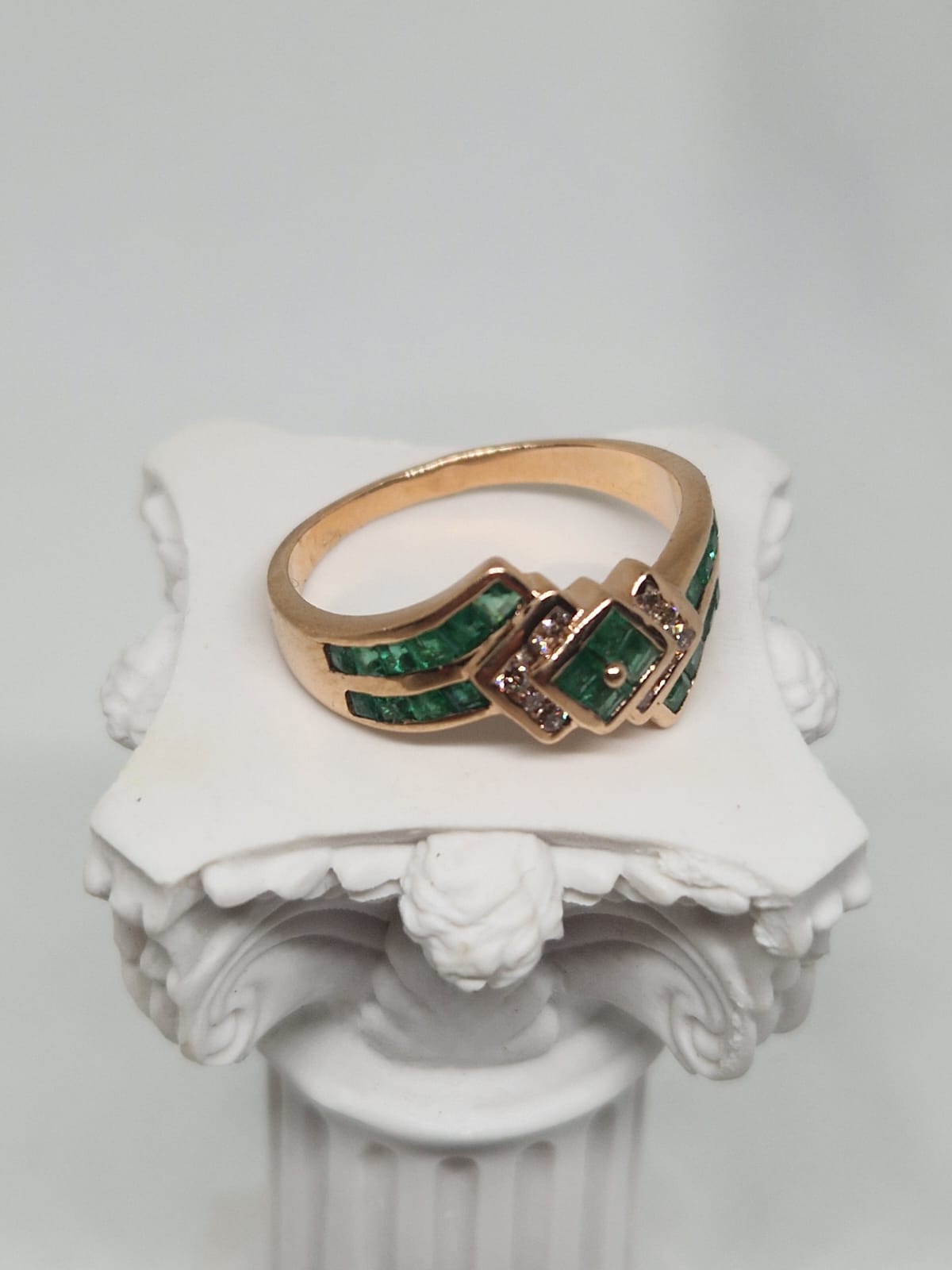 Gold Ring with Green Gemstones