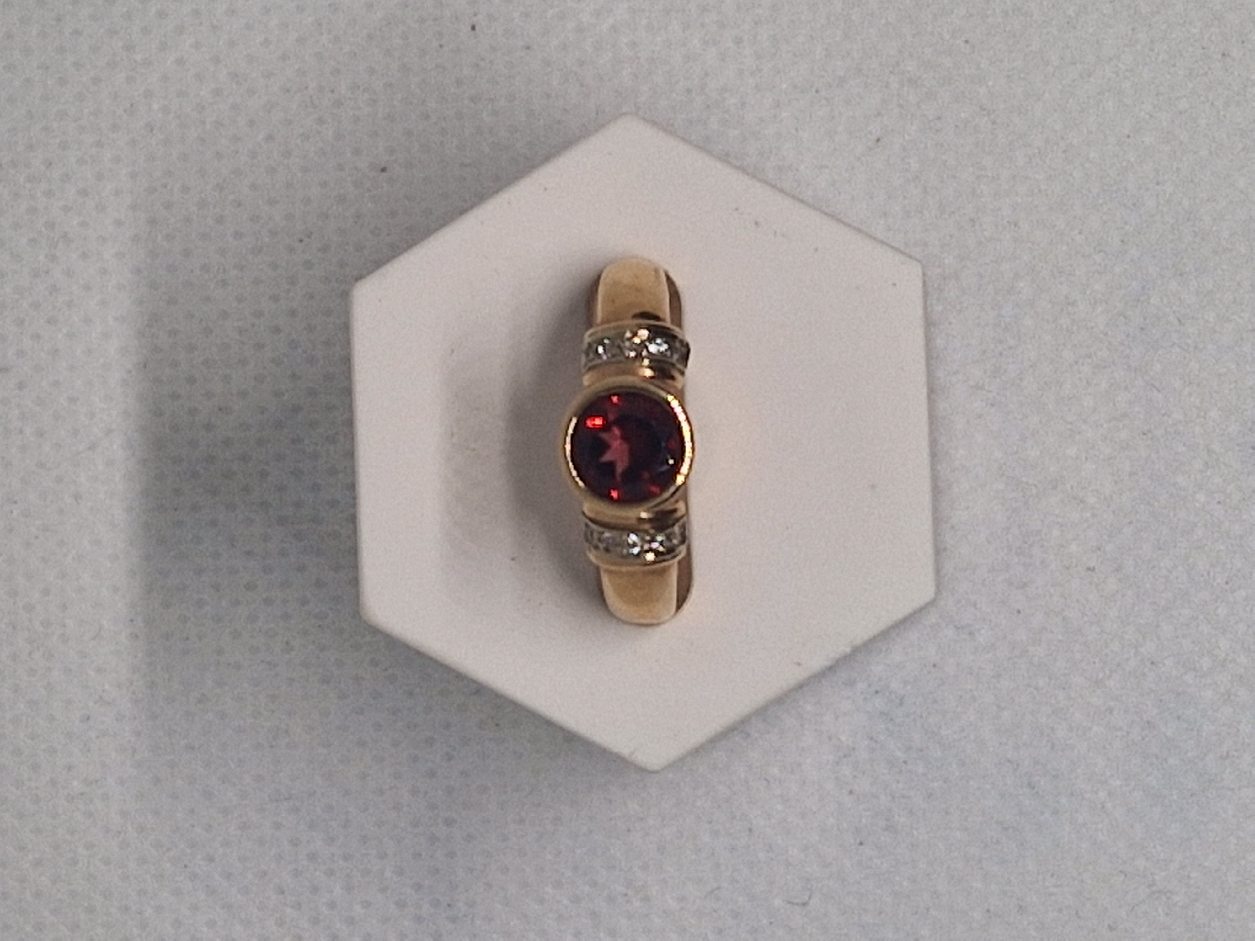 Gold Ring with Garnet Gemstone