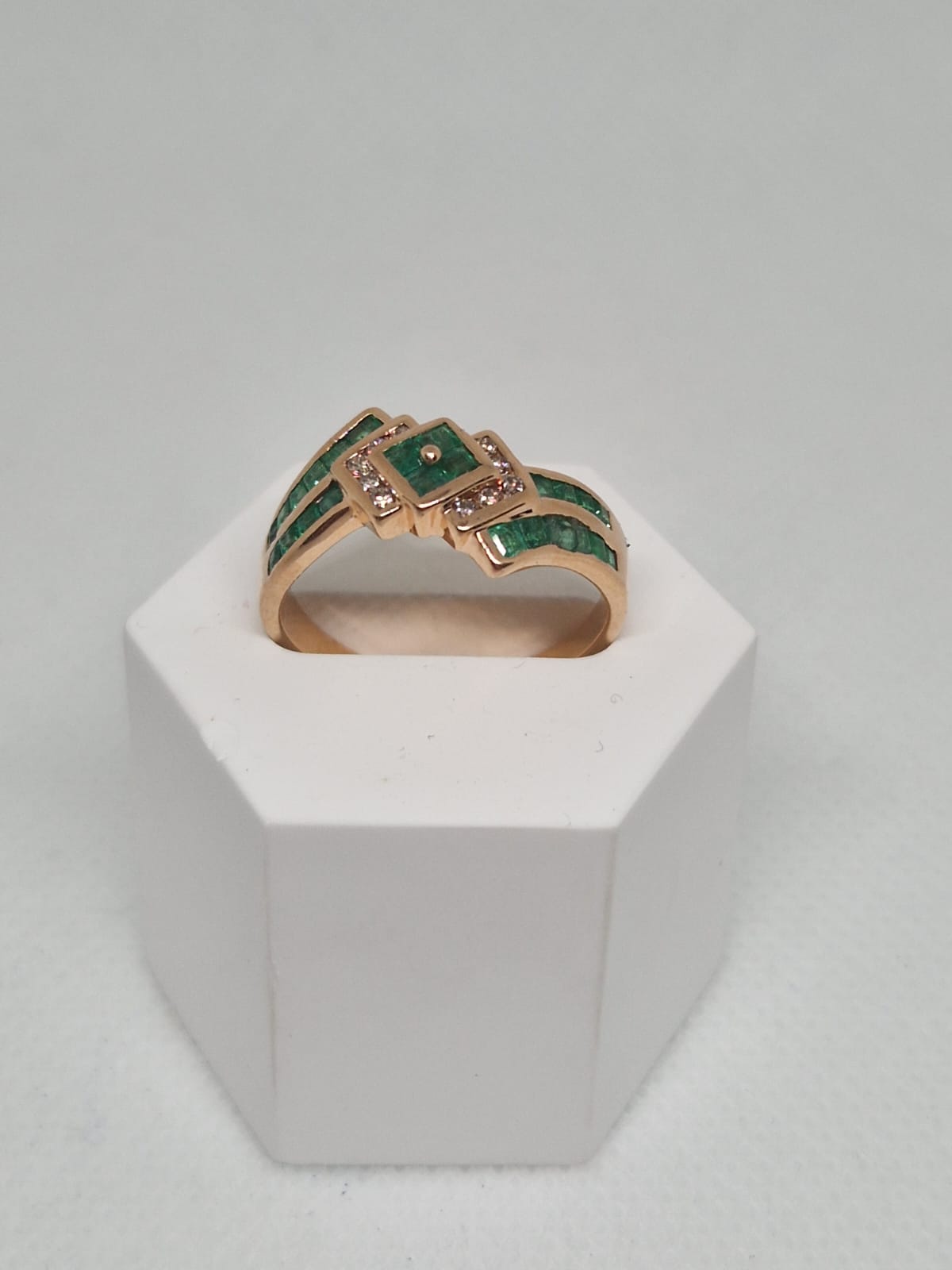 Gold Ring with Green Gemstones