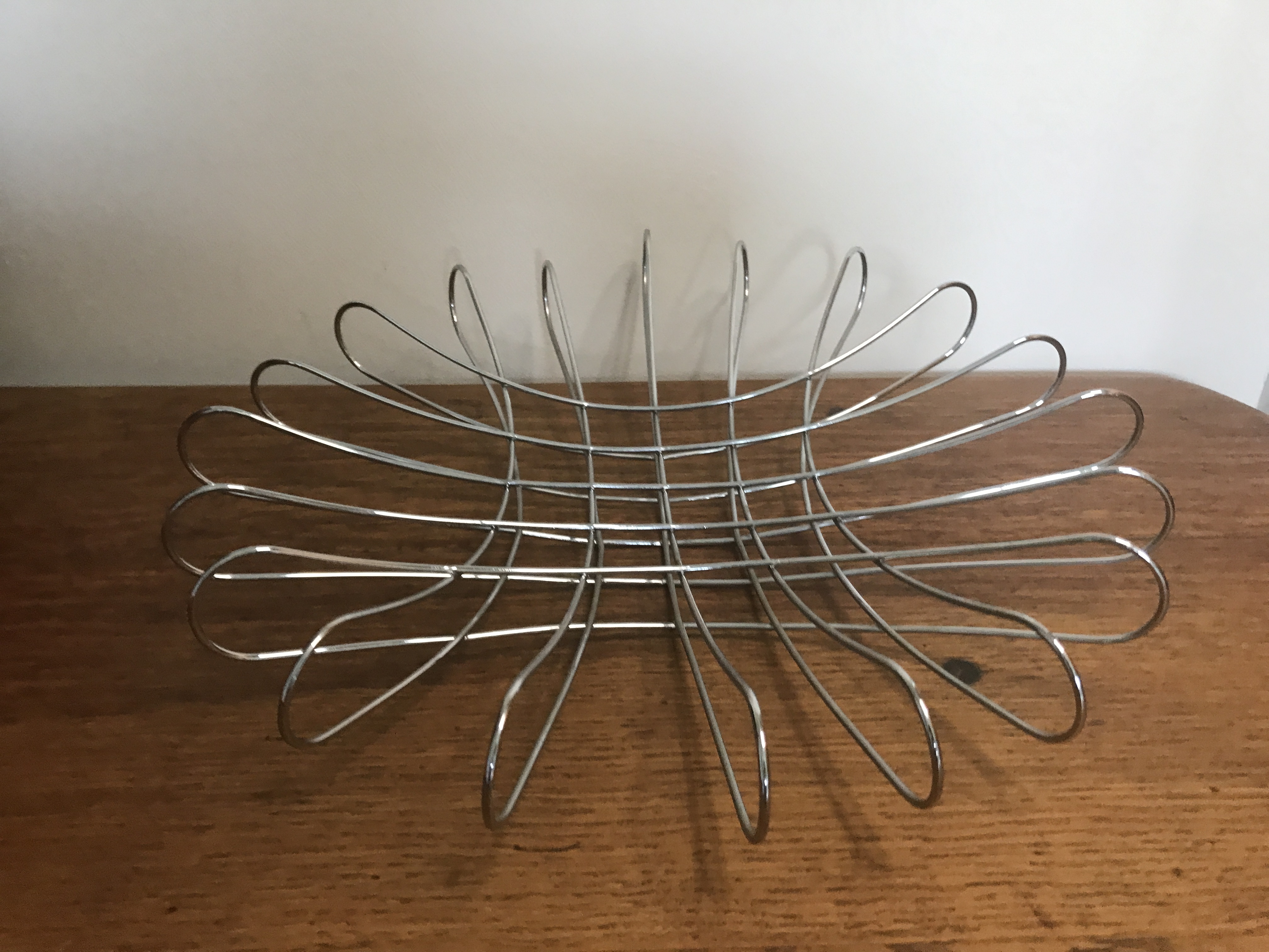 Vintage Mid century modern steel wire type metal fruit bowl.