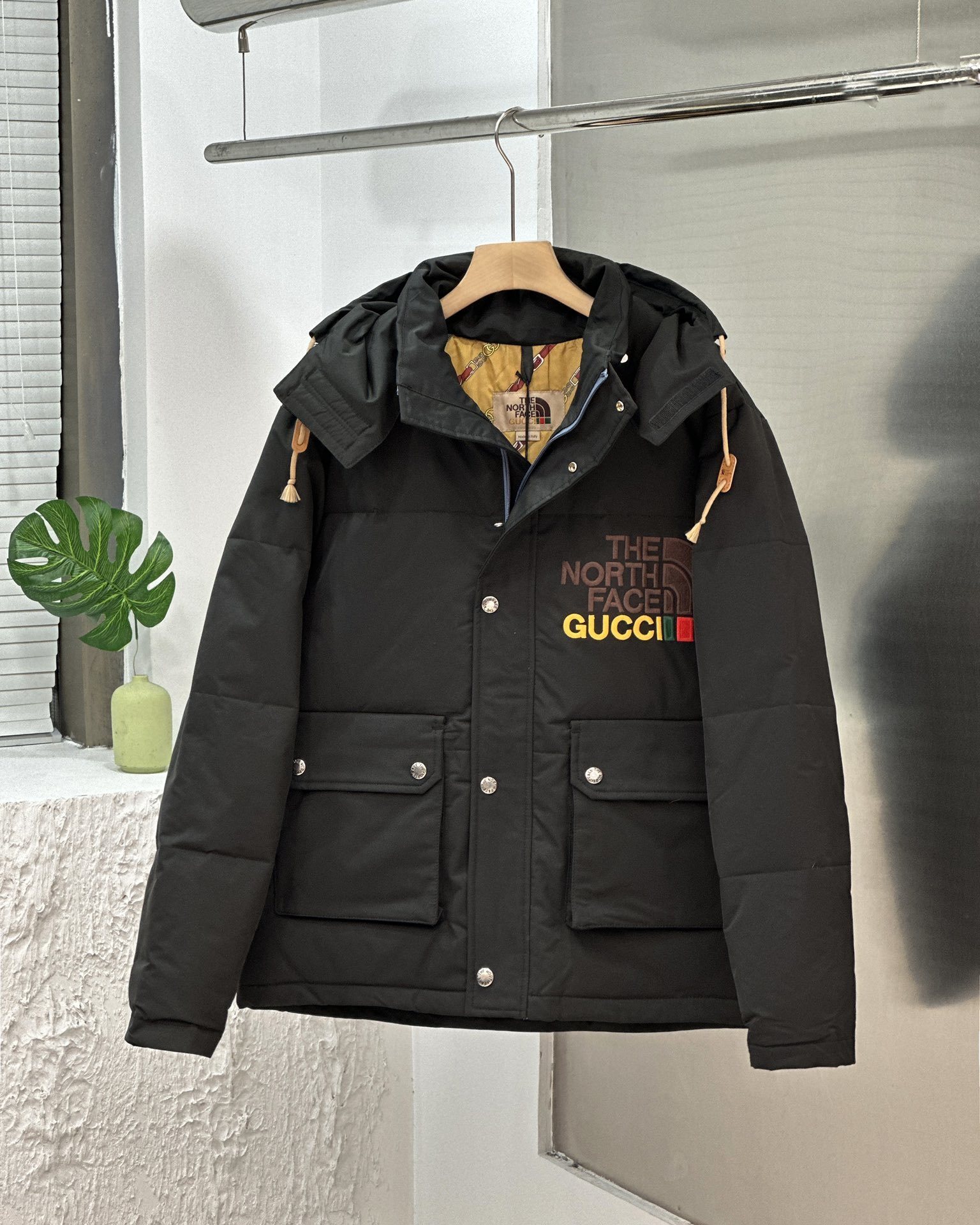 Doudoune GG x TNF