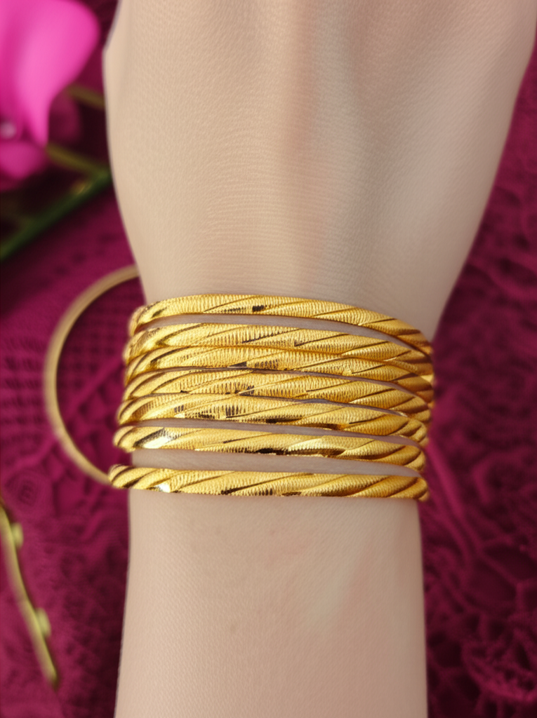 Radiant Elegance – 4-Piece Gold-Toned Bangles Set