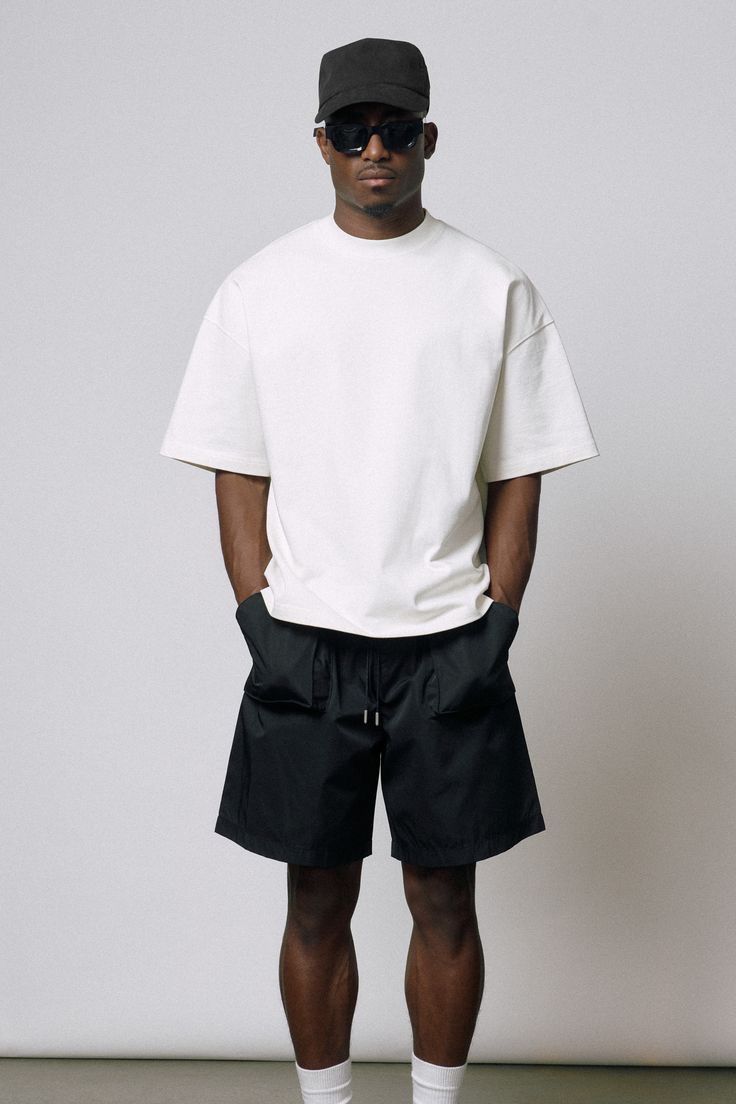 White T-Shirt and Black Shorts