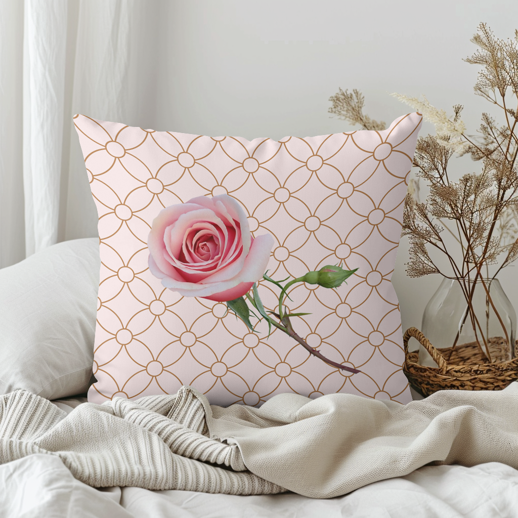Cushion for the bedroom or lounge, pretty rose on a grid background.