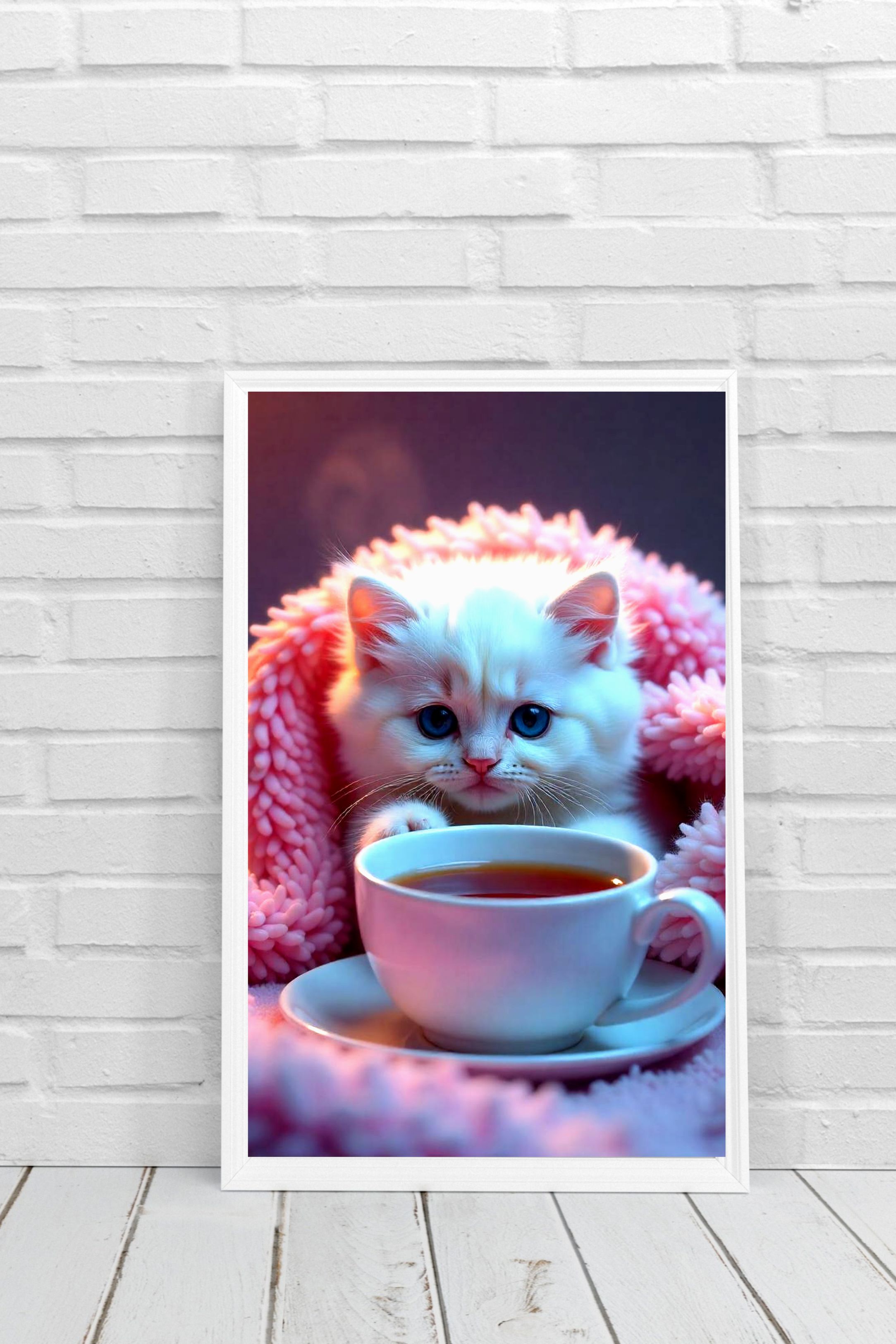 Framed Cozy Kitten canvas Art Print with its cup of tea. FROM THE WAREHOUSE