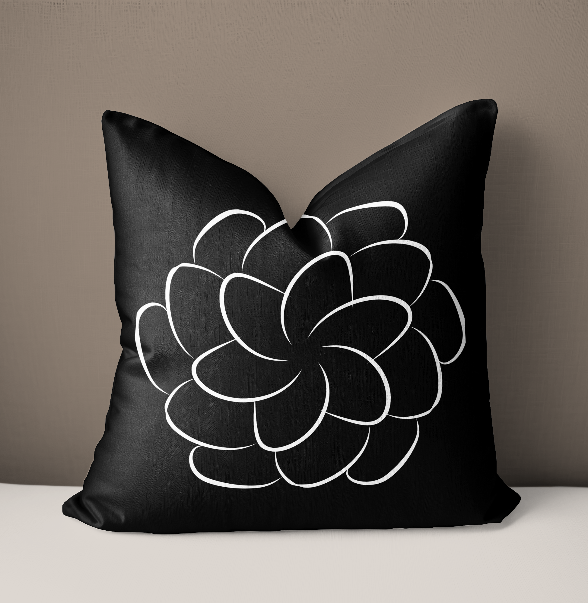 Black and white modern cushion, attractive white pattern on black.