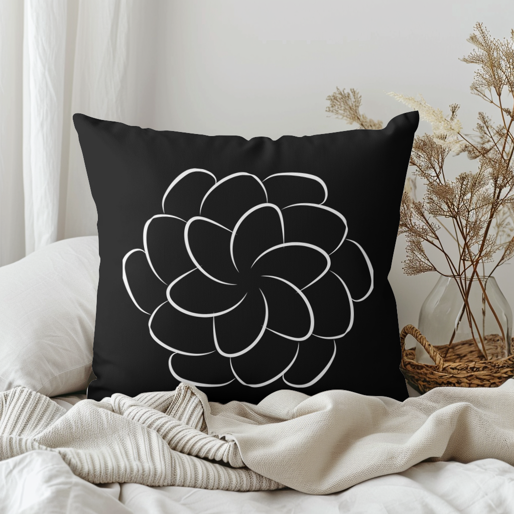 Black and white modern cushion, attractive white pattern on black.