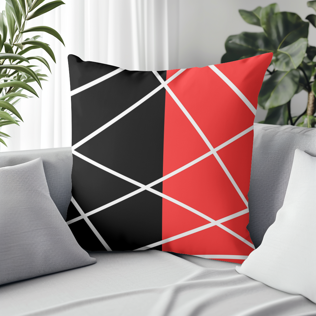 Stunning cushion in a fresh red, black, and white lines design.