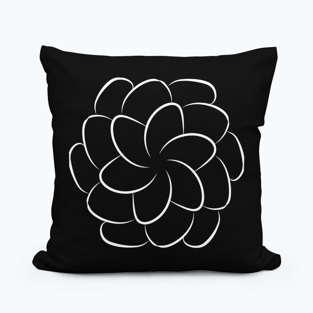 Black and white modern cushion, attractive white pattern on black.