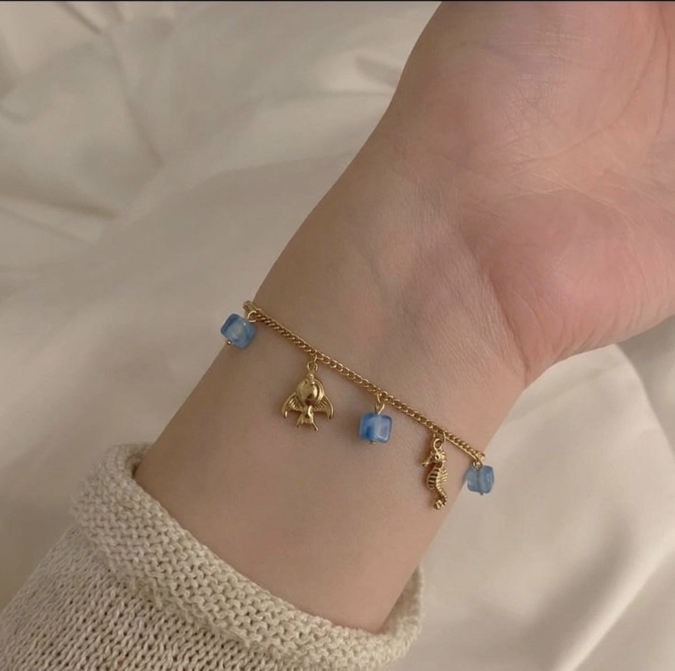 Gold Charm Bracelet with Blue Beads