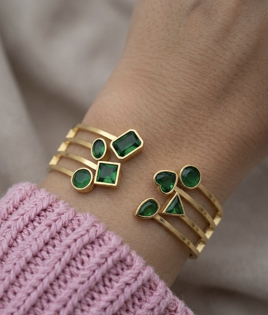 Elegant Gold Bracelet with Green Gemstones