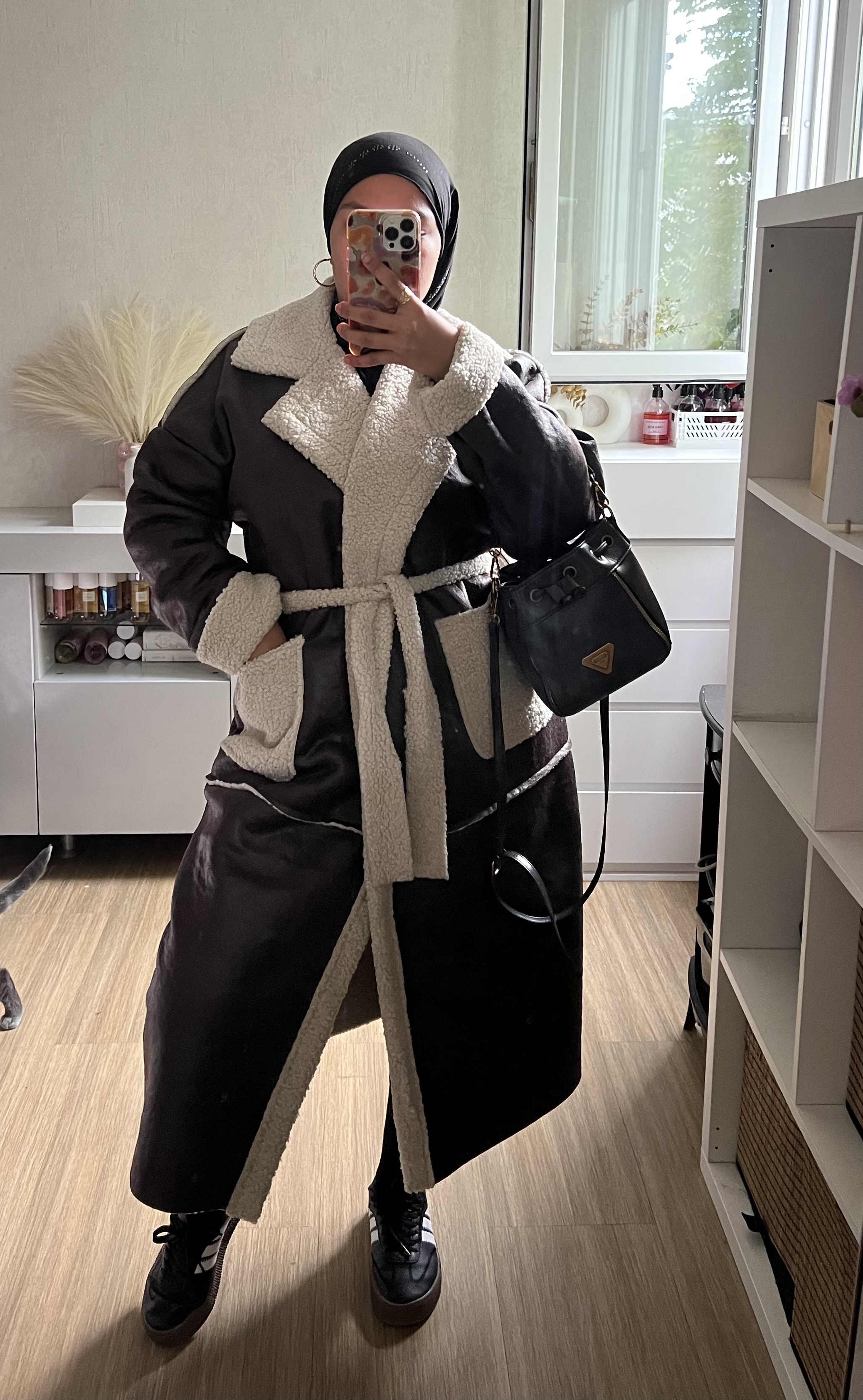 Manteau long en laine avec moumoute