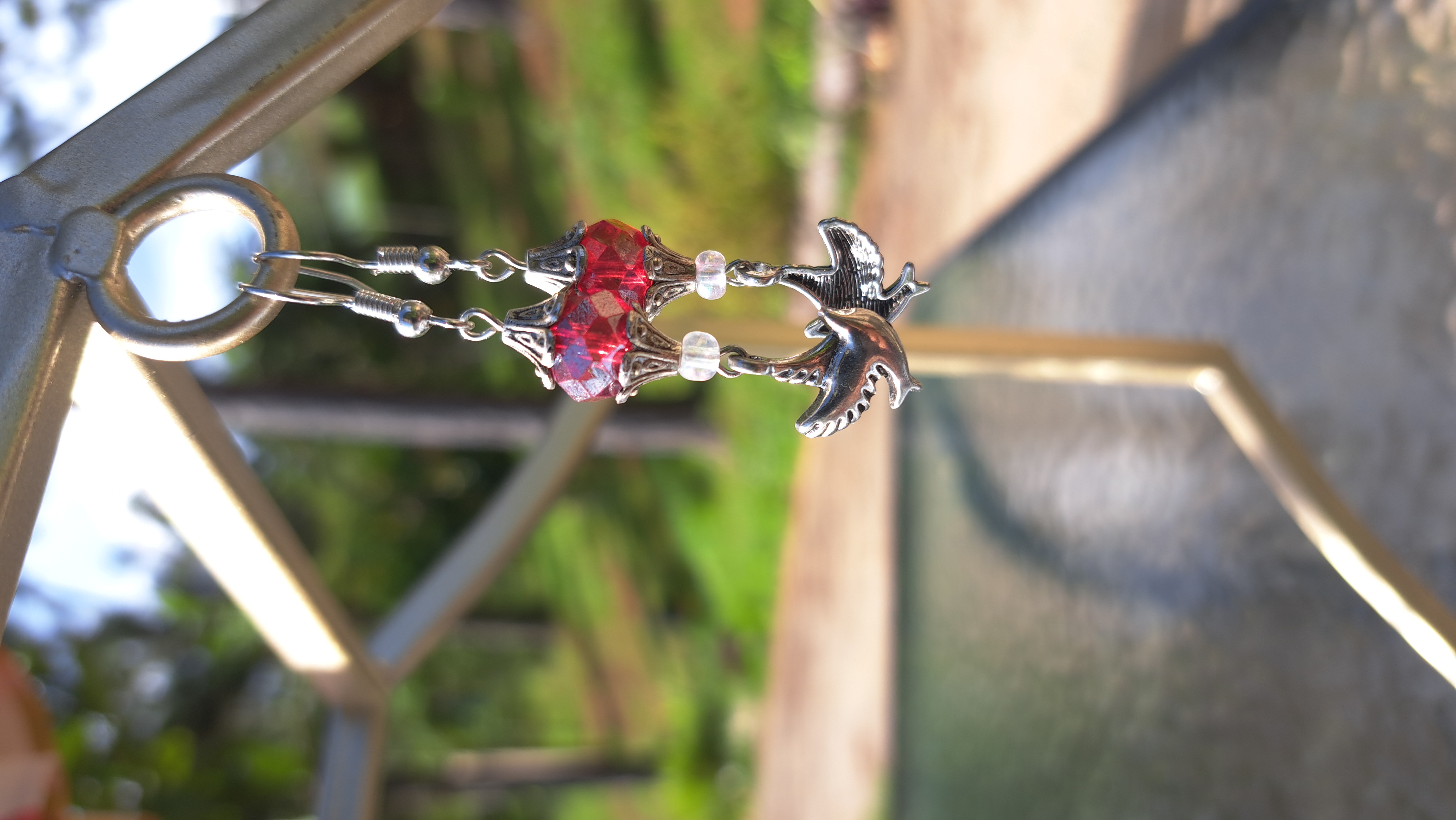 Handcrafted beaded earrings with charms