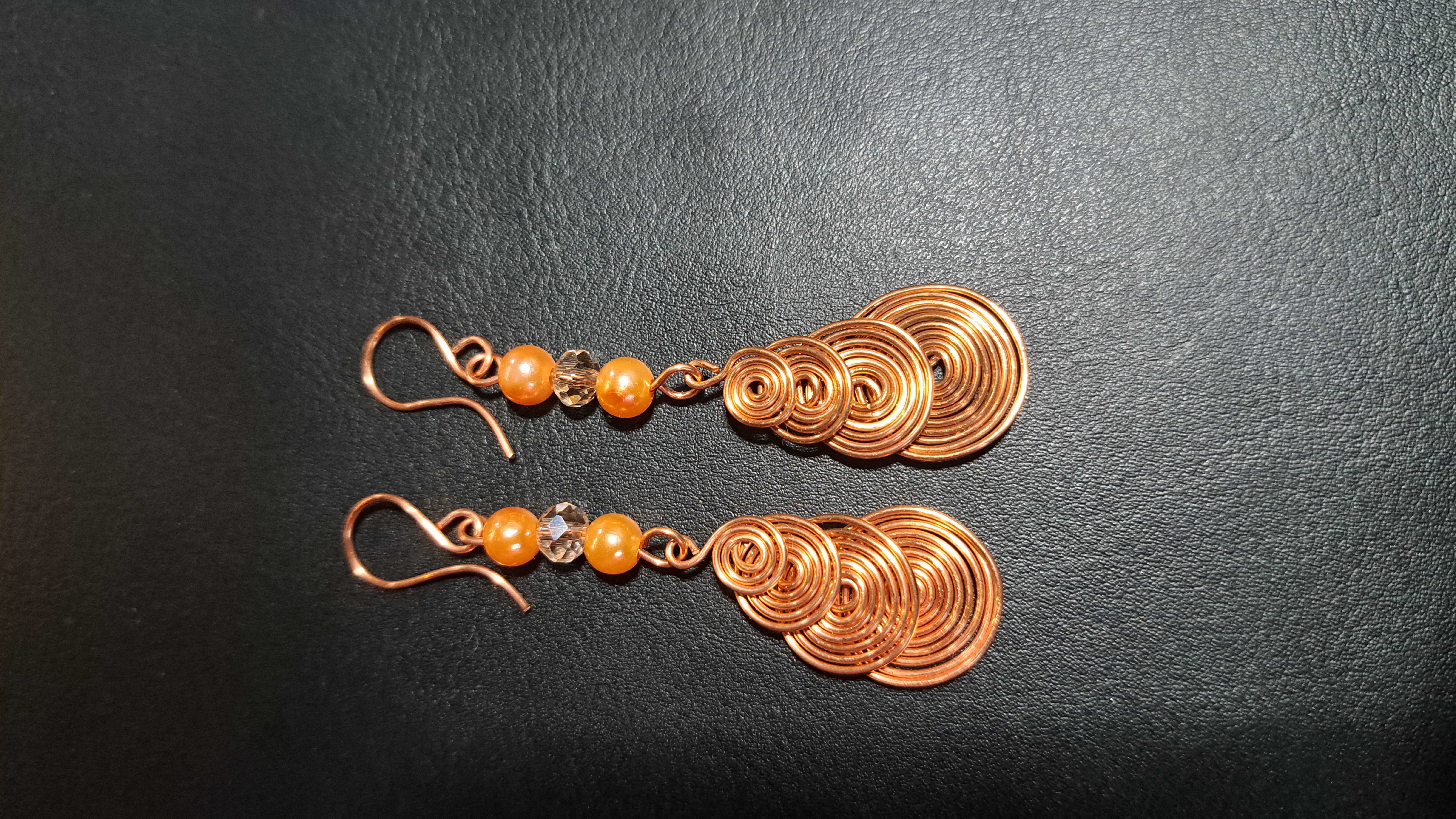 Pearl adorned spiral Earrings