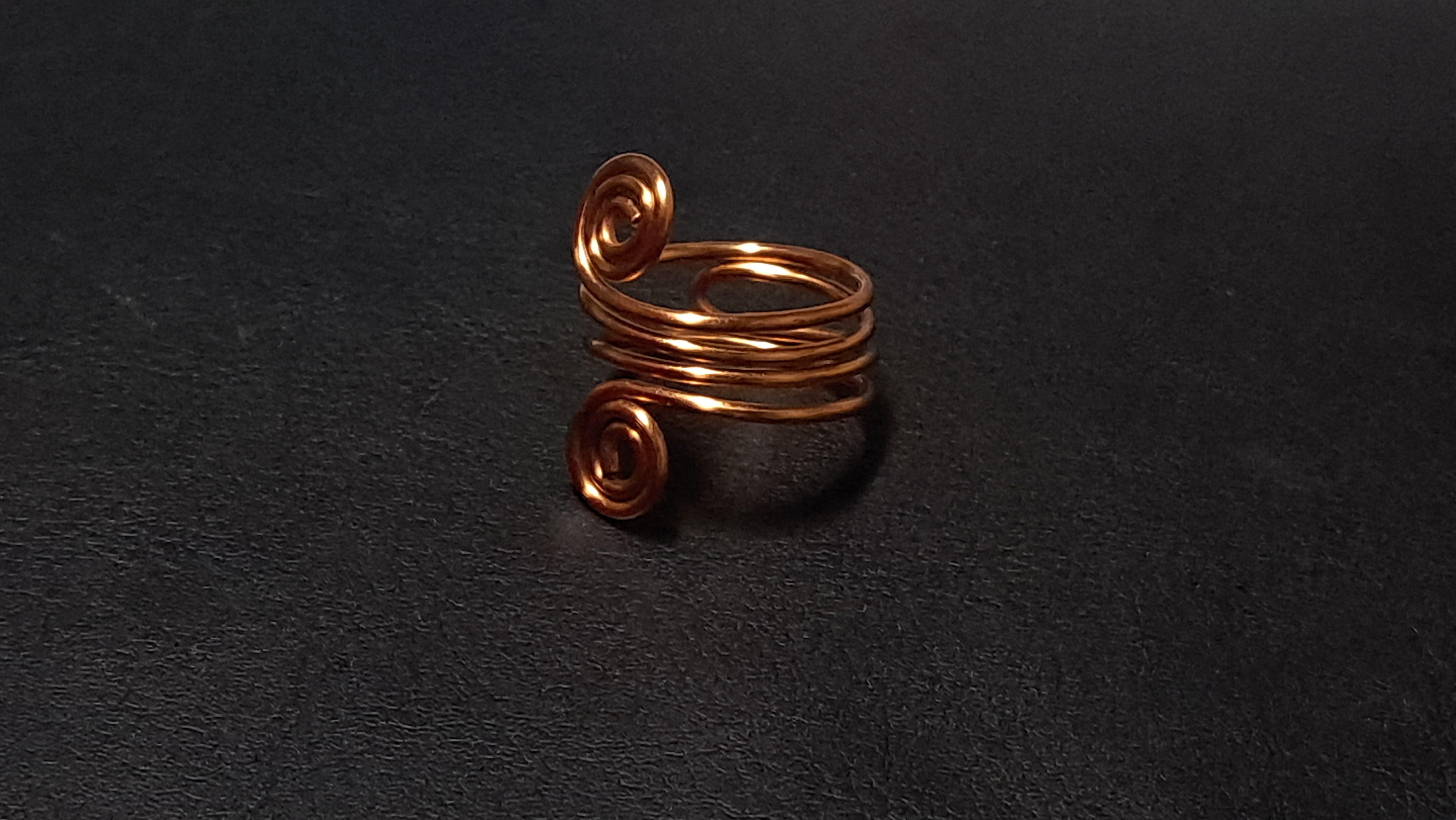 Handcrafted multiple loop Copper Spiral Ring
