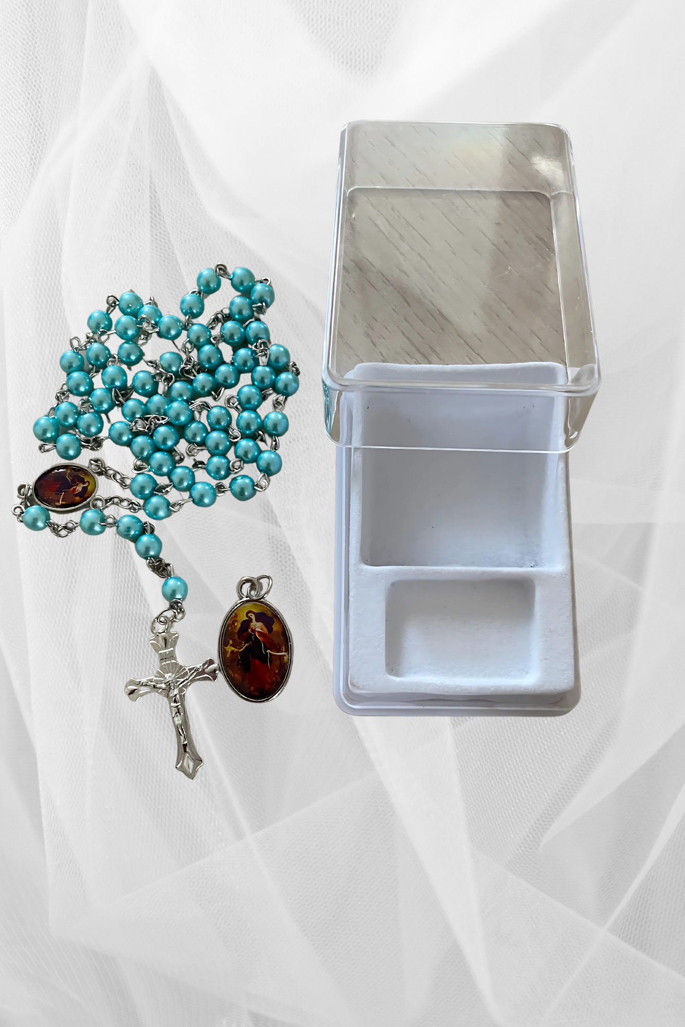 Mary Undoer of Knots Rosary with a Medal.