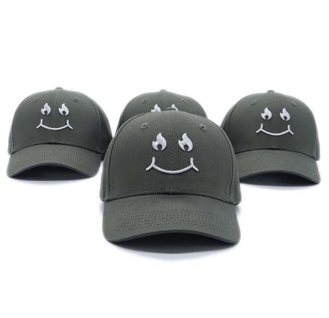 Grey Cap Silver Smiley Face logo