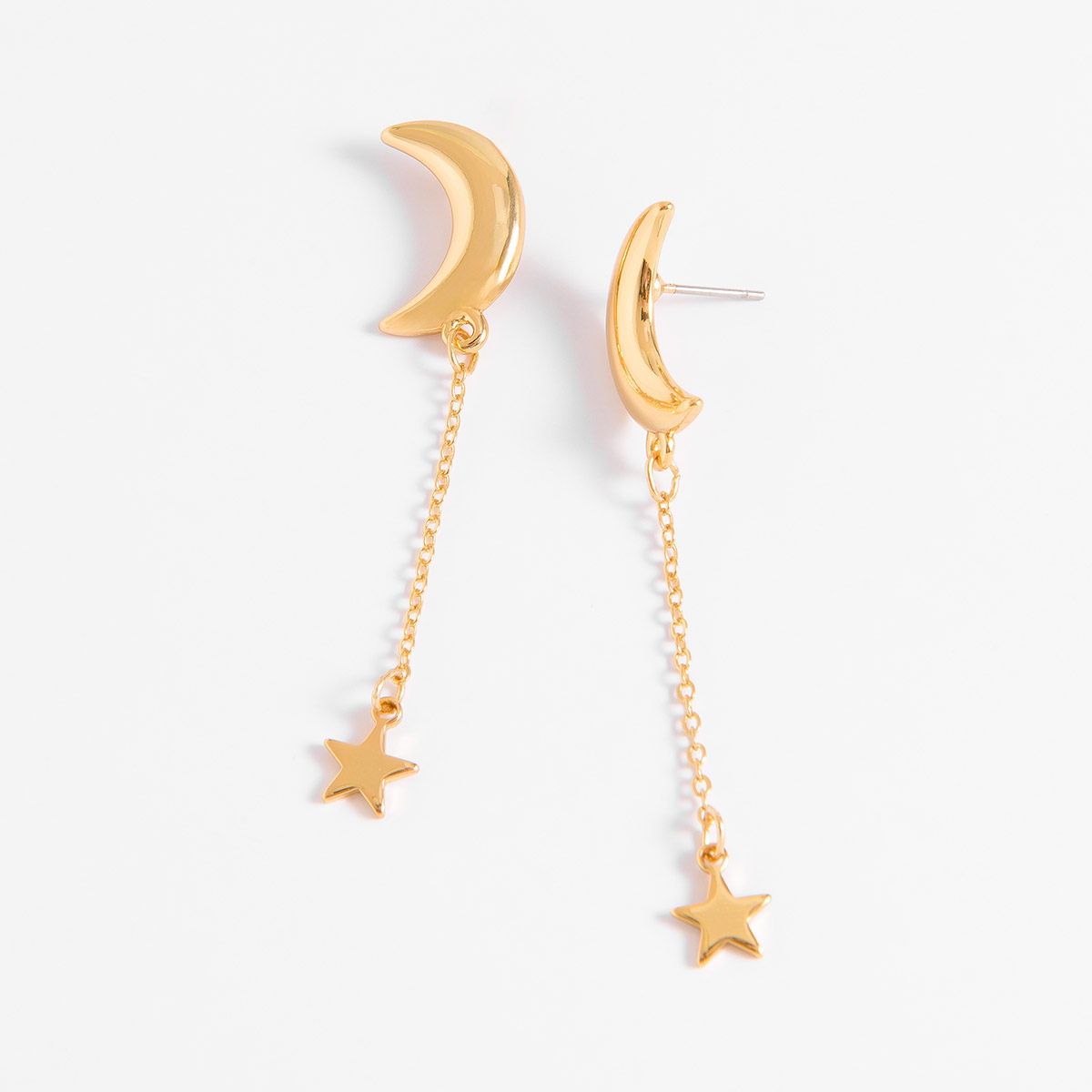 Aretes largos en baño de oro con luna y estrella únicos