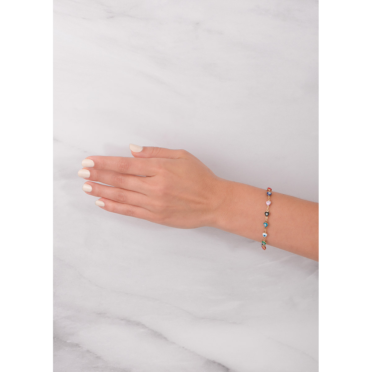 Pulsera baño de oro con diseño de corazones y ojo turco