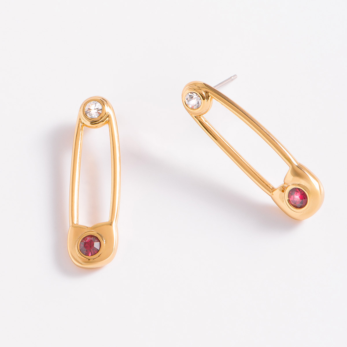 Aretes de broche con piedras cristal y rubí en oro 18k