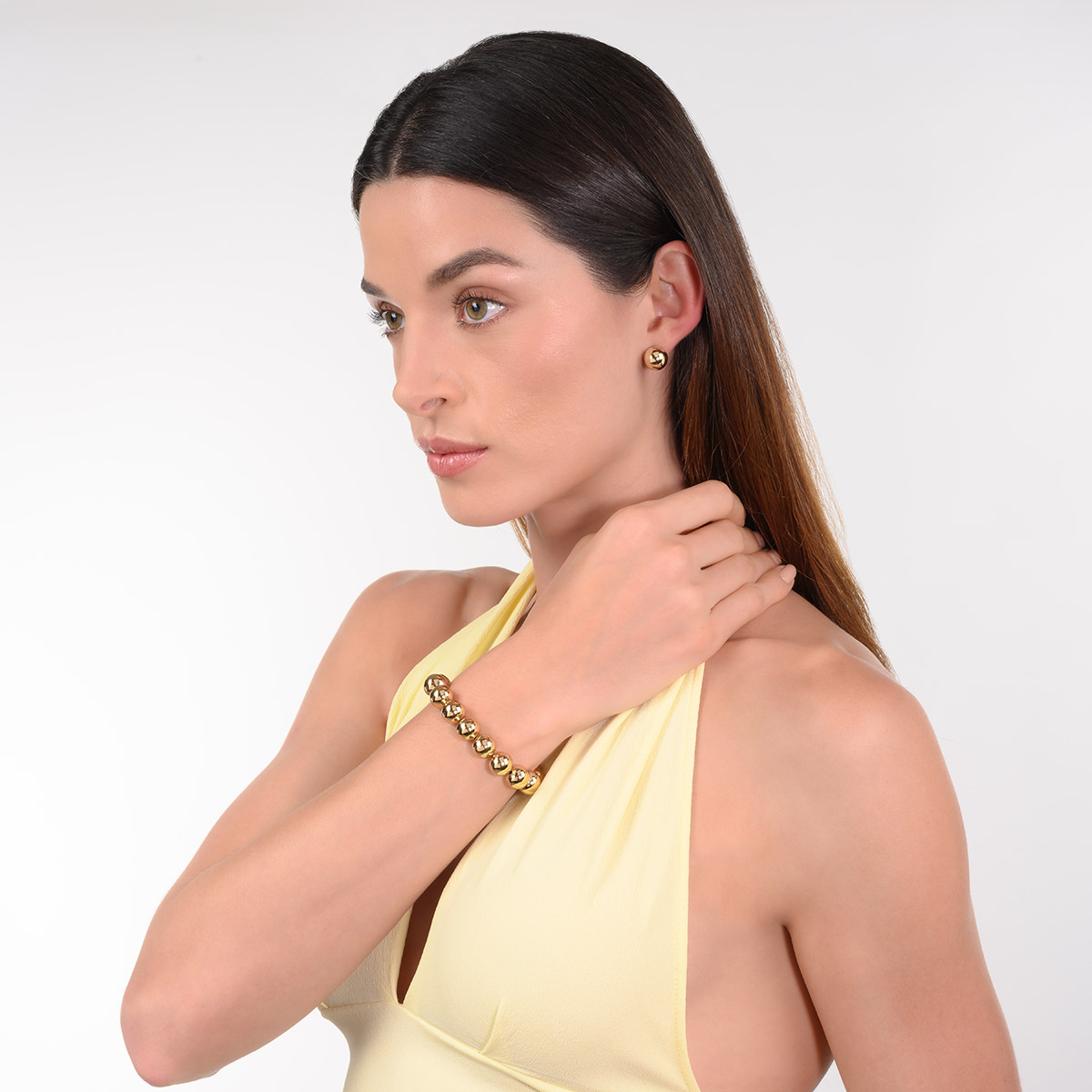 Aretes de bola dorada