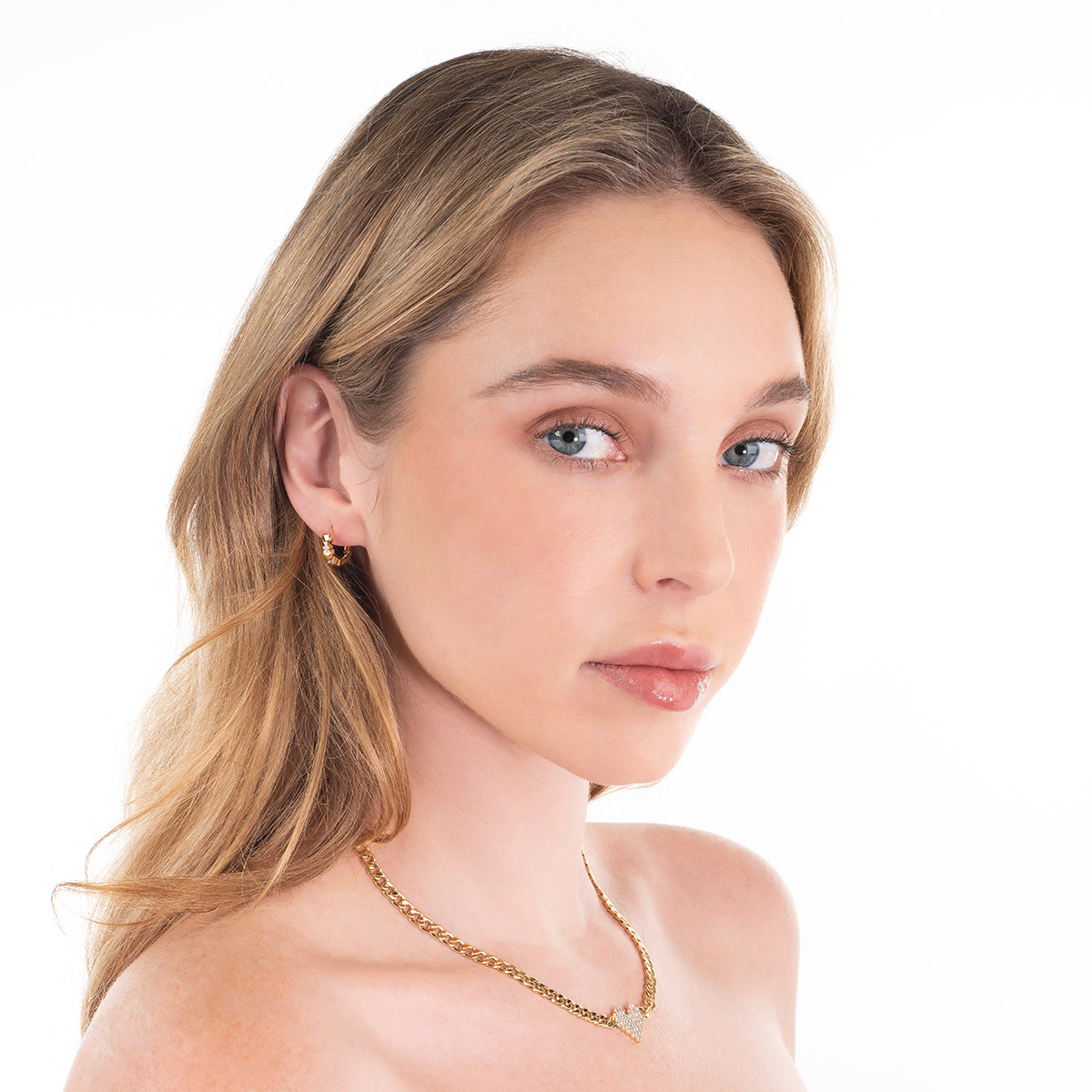 Aros con 4 baños  de oro, con corazones