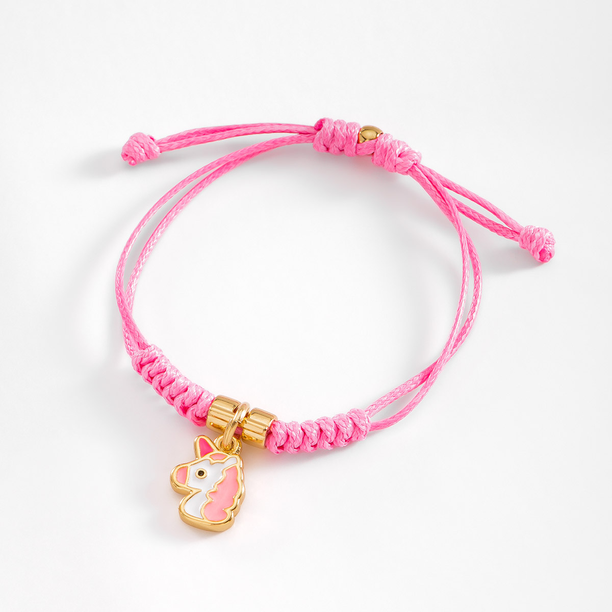 Pulsera con dije de unicornio en tono rosa ajustable