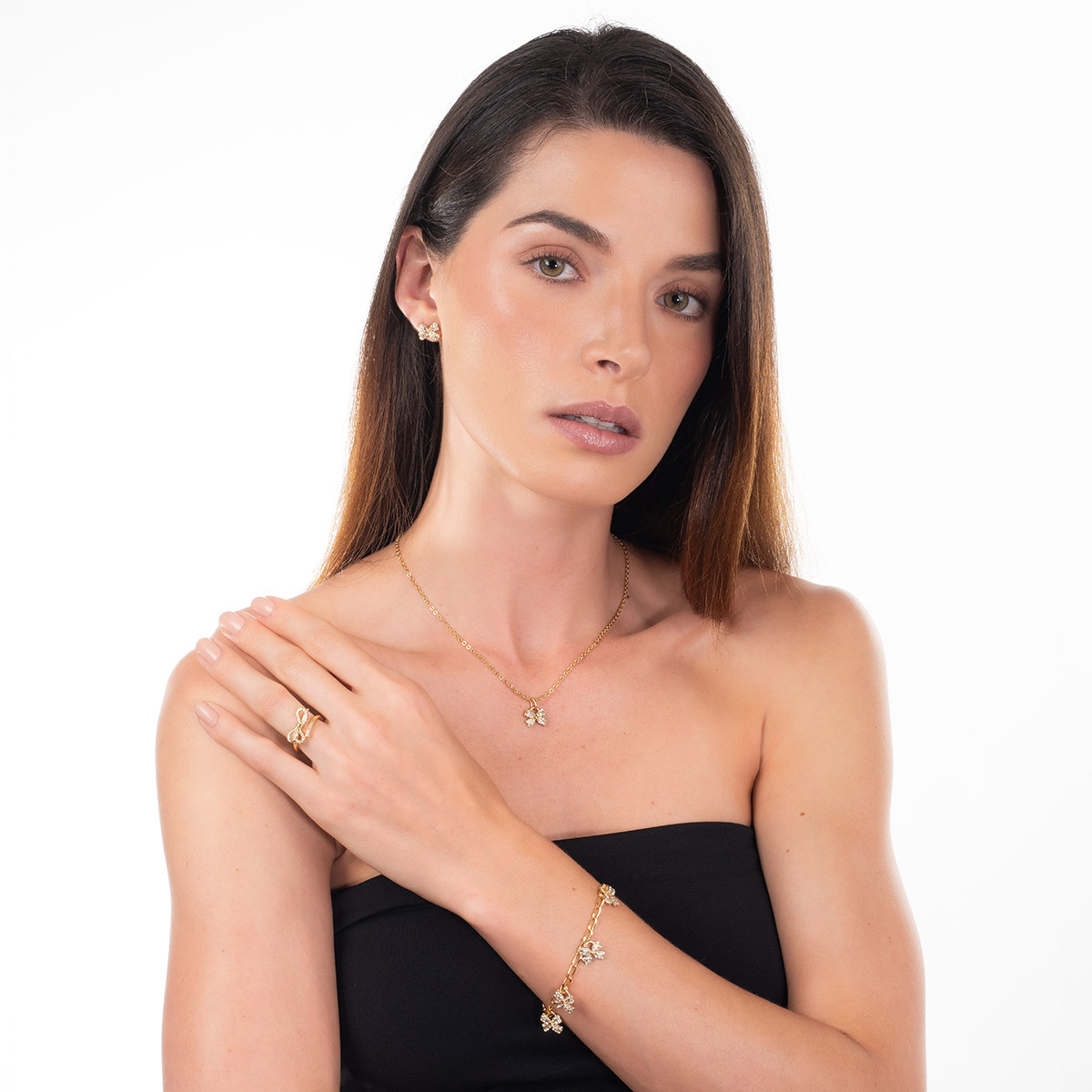 Pendientes de lazo dorados con 4 baños de oro