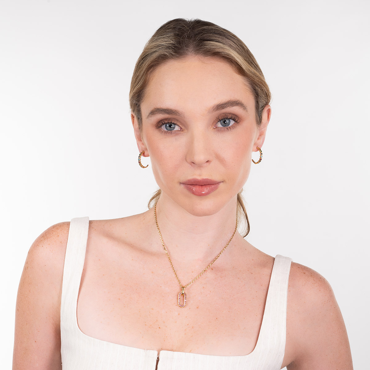 Aretes en baño de oro mini estrellas con esmalte tonos pastel