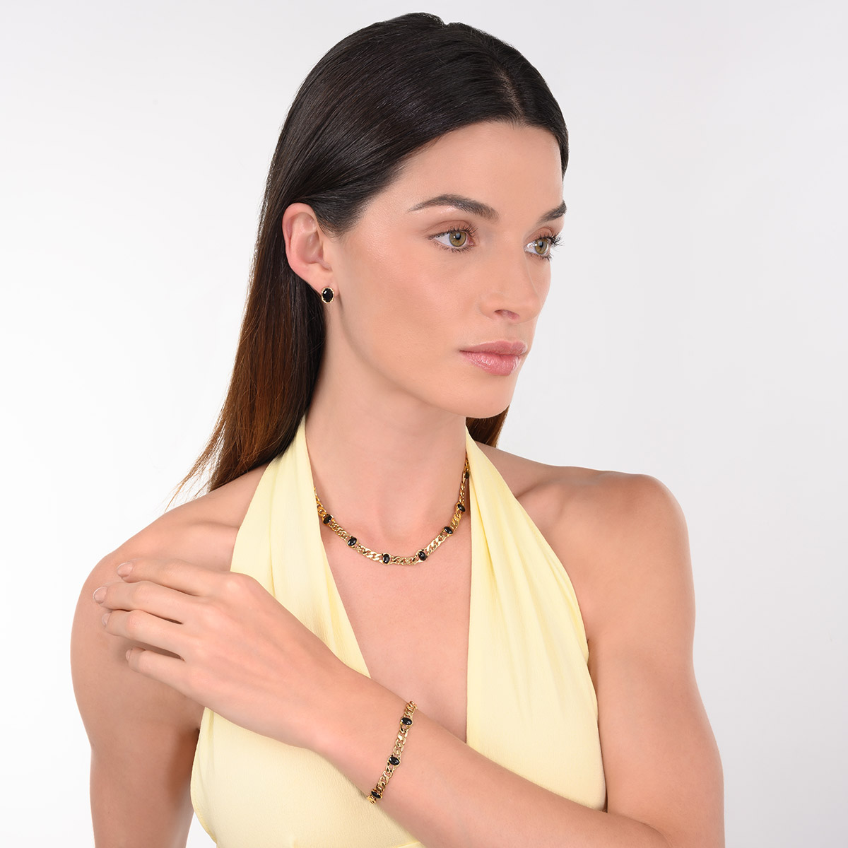 Pulsera en baño de oro eslabones piedras negras diseño moderno