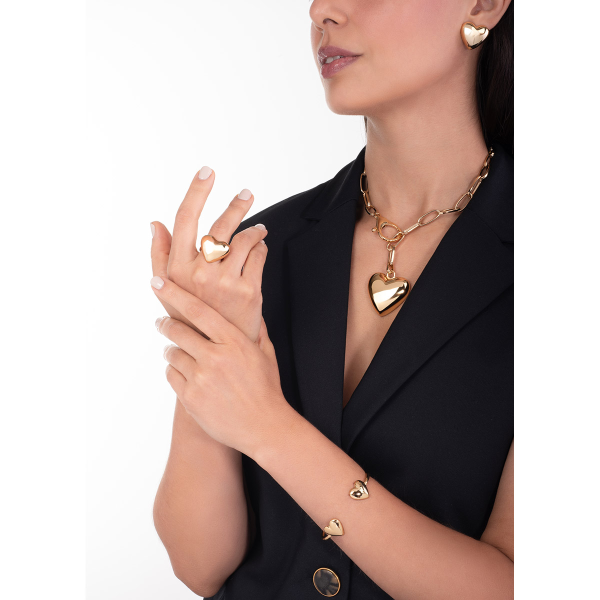 Collar en baño de oro con eslabones y dije de corazón sólido