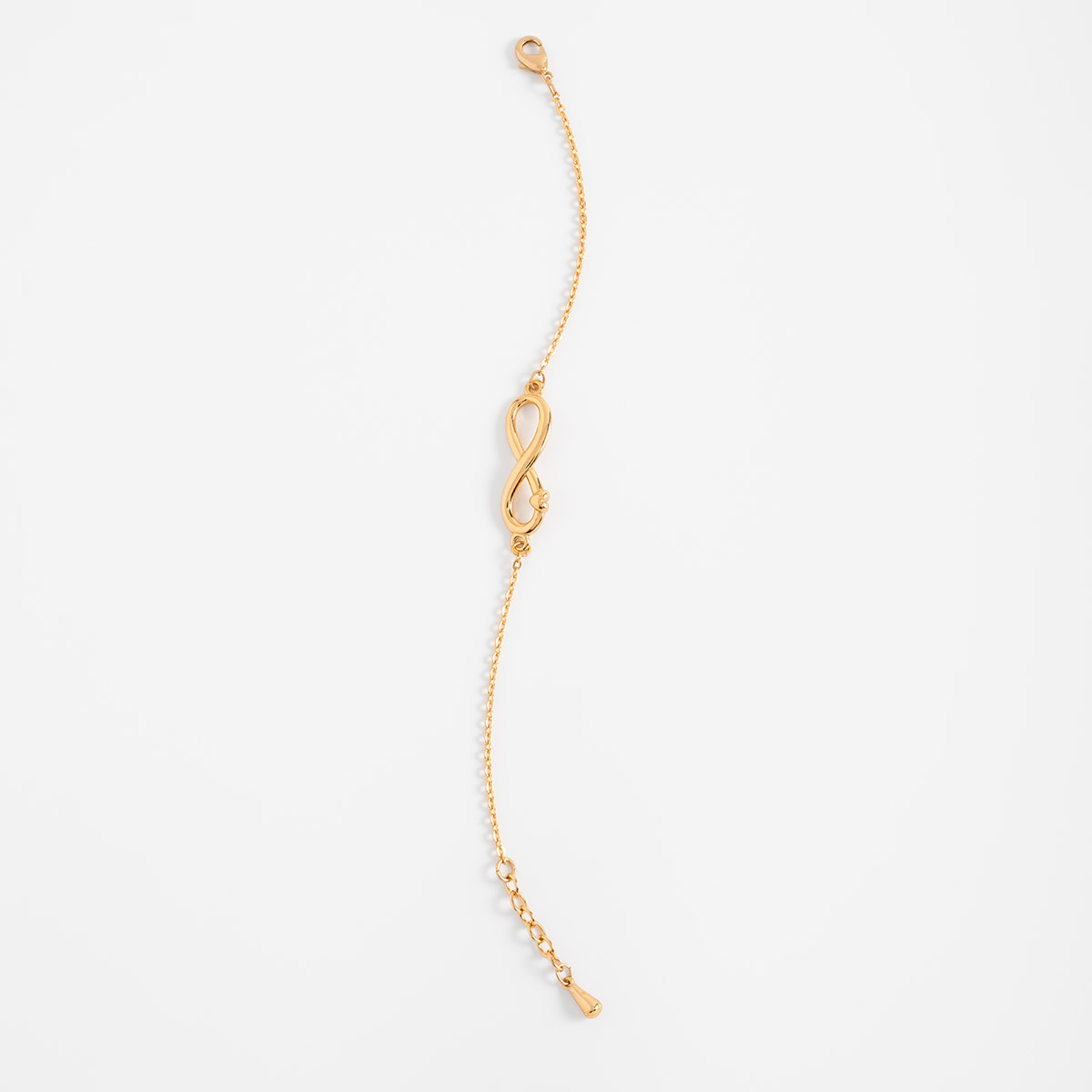 Pulsera en baño de oro con dije infinito pulido