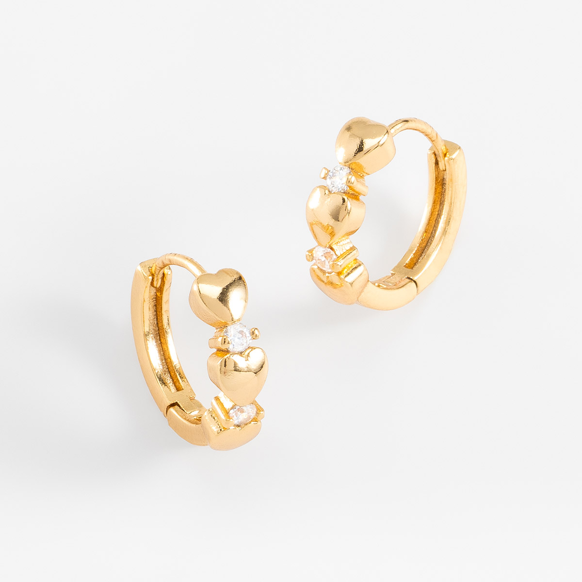 Aros con 4 baños de oro, con corazones