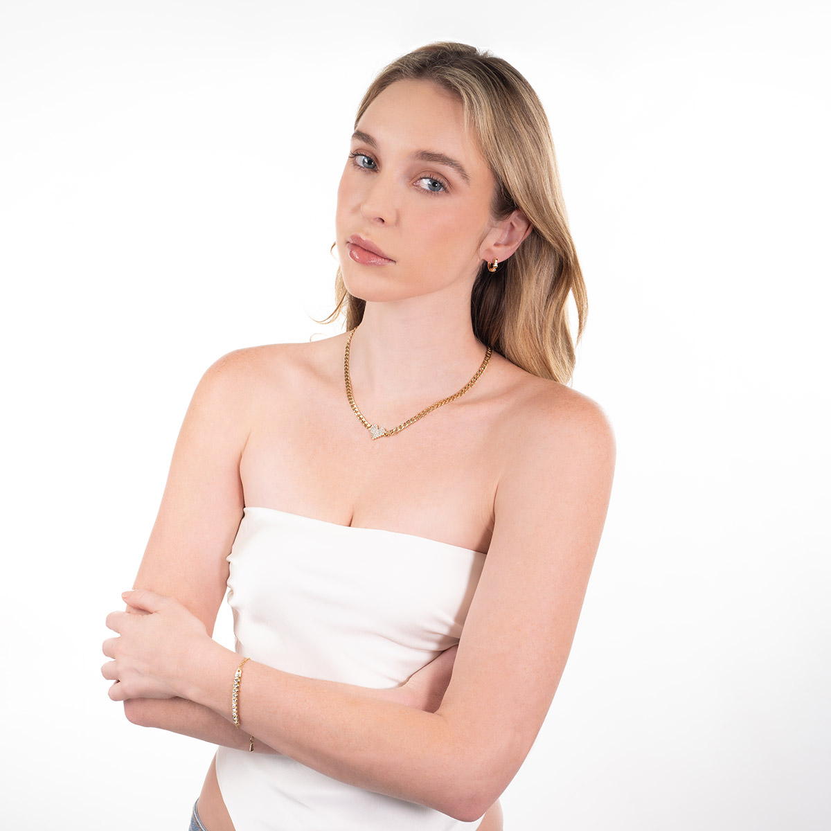 Aros con 4 baños  de oro, con corazones