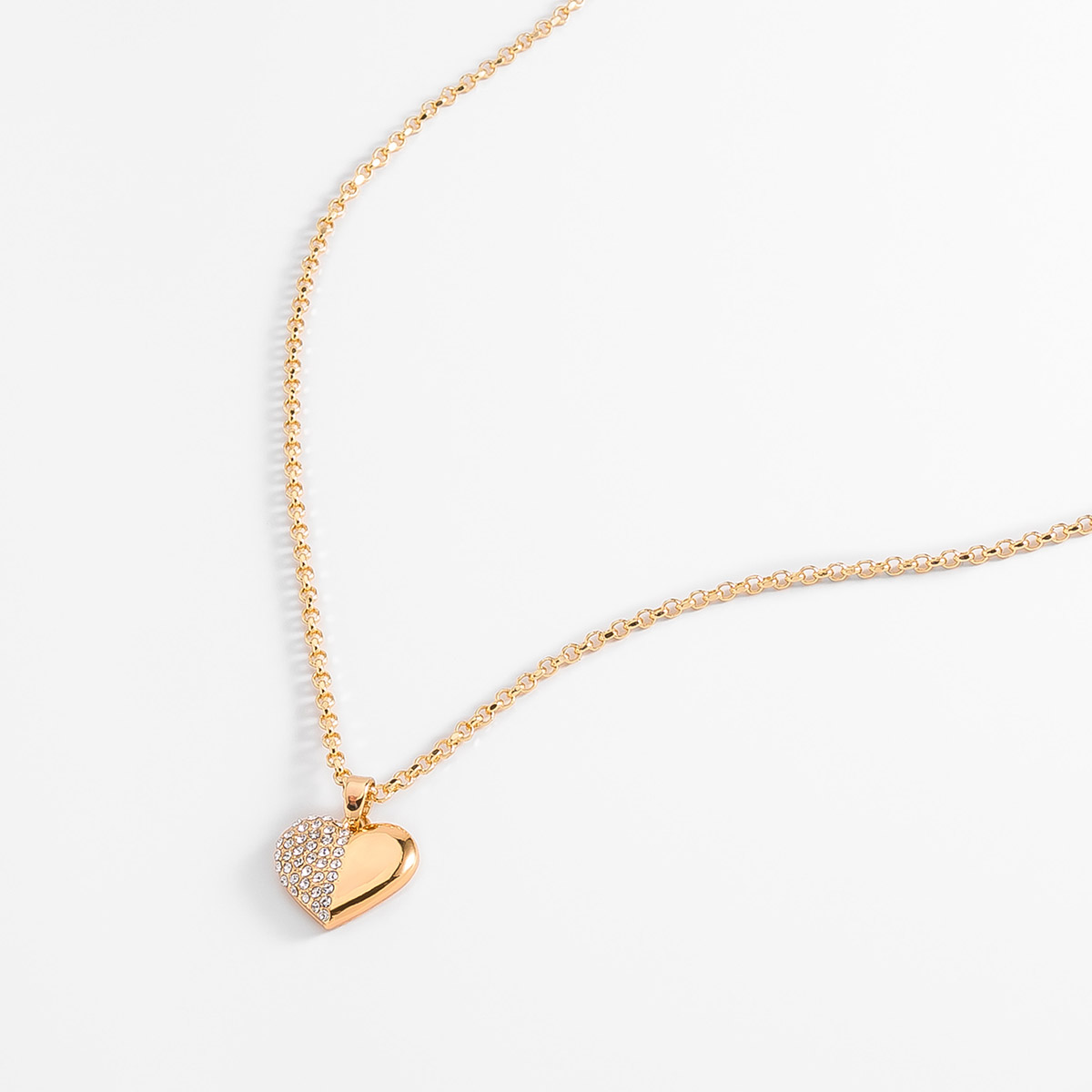 Collar en baño de oro con dije corazón asimétrico brillante