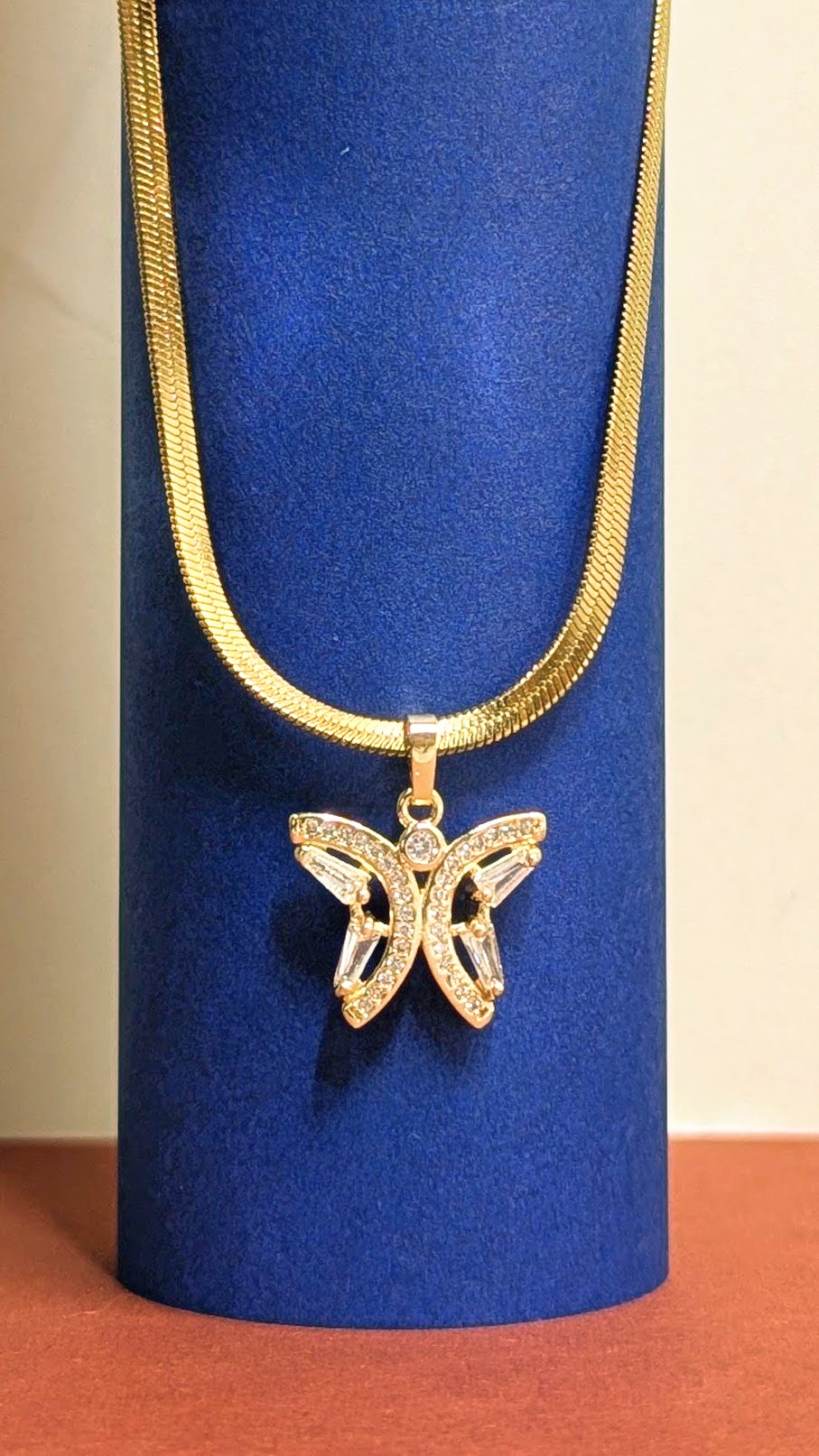 Gold necklace with butterfly pendant