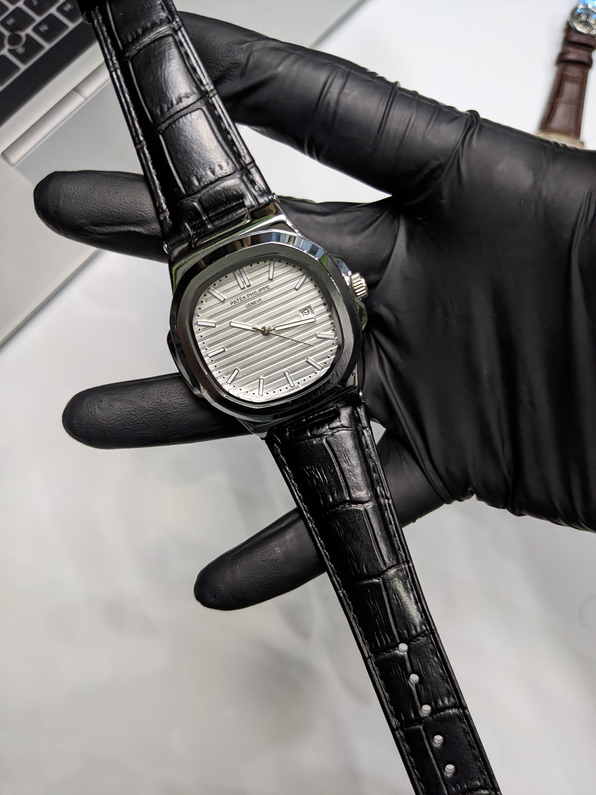 PP Nautilus Black Leather strap (Silver)