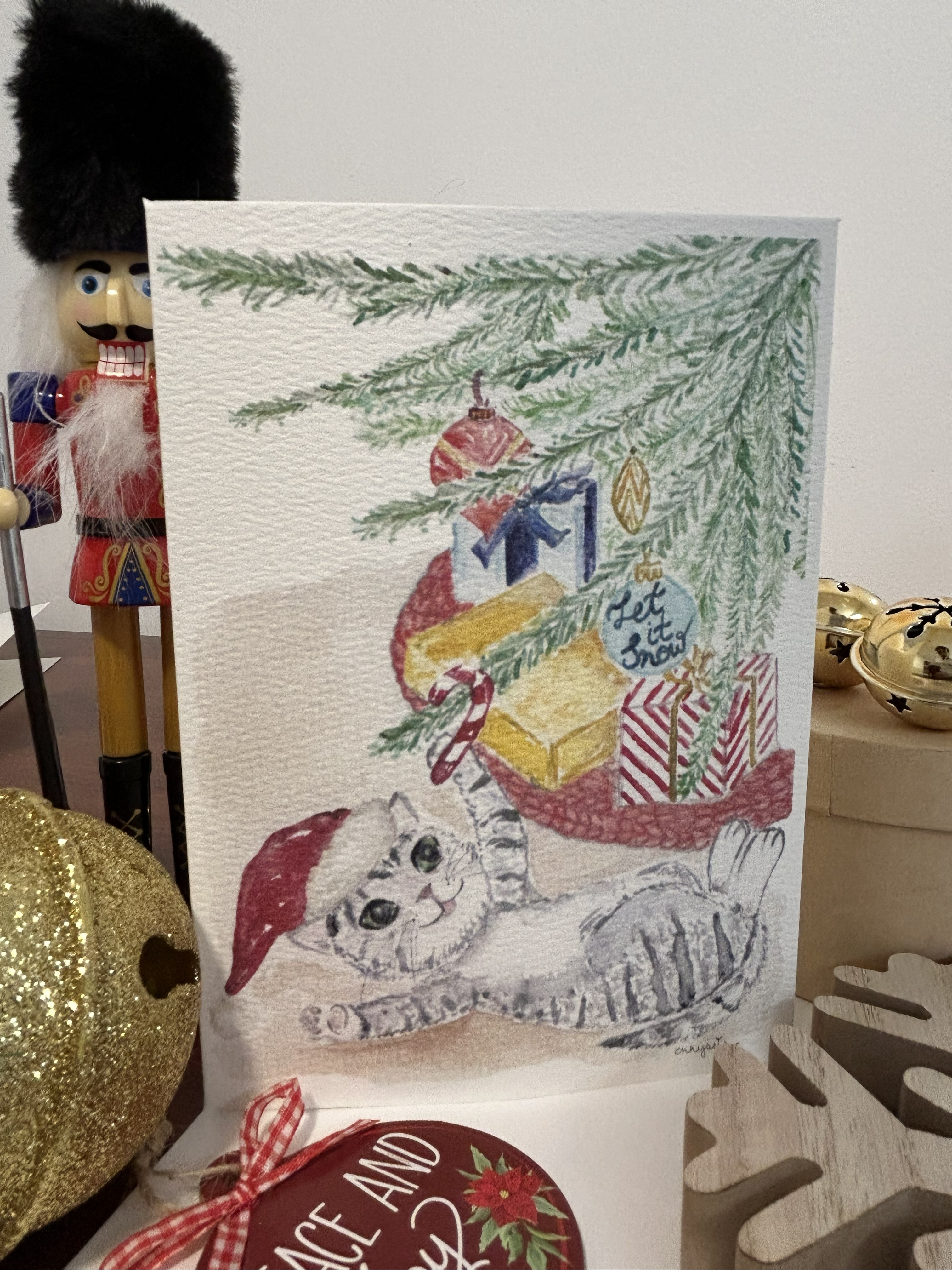 Cat Under A Christmas Tree