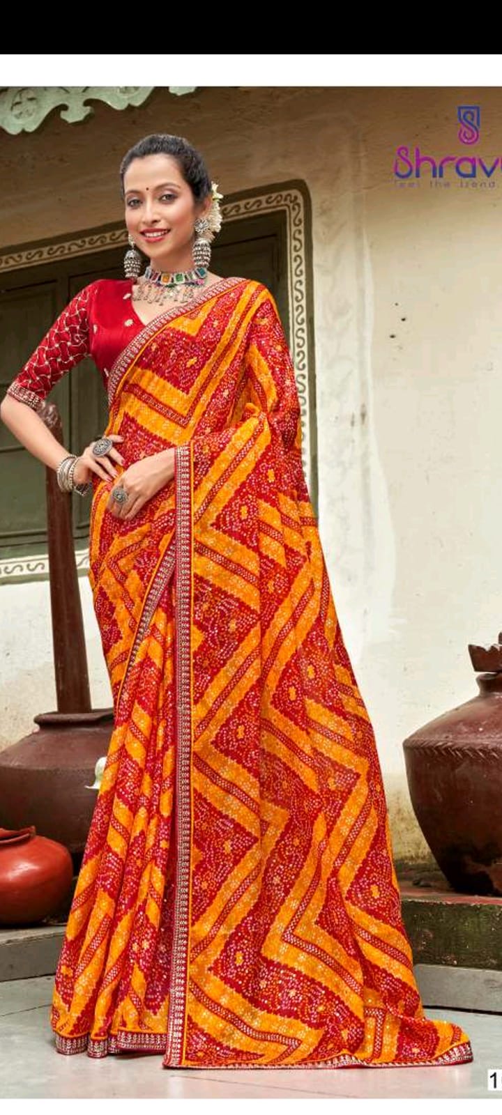 Vibrant Orange-Red Saree