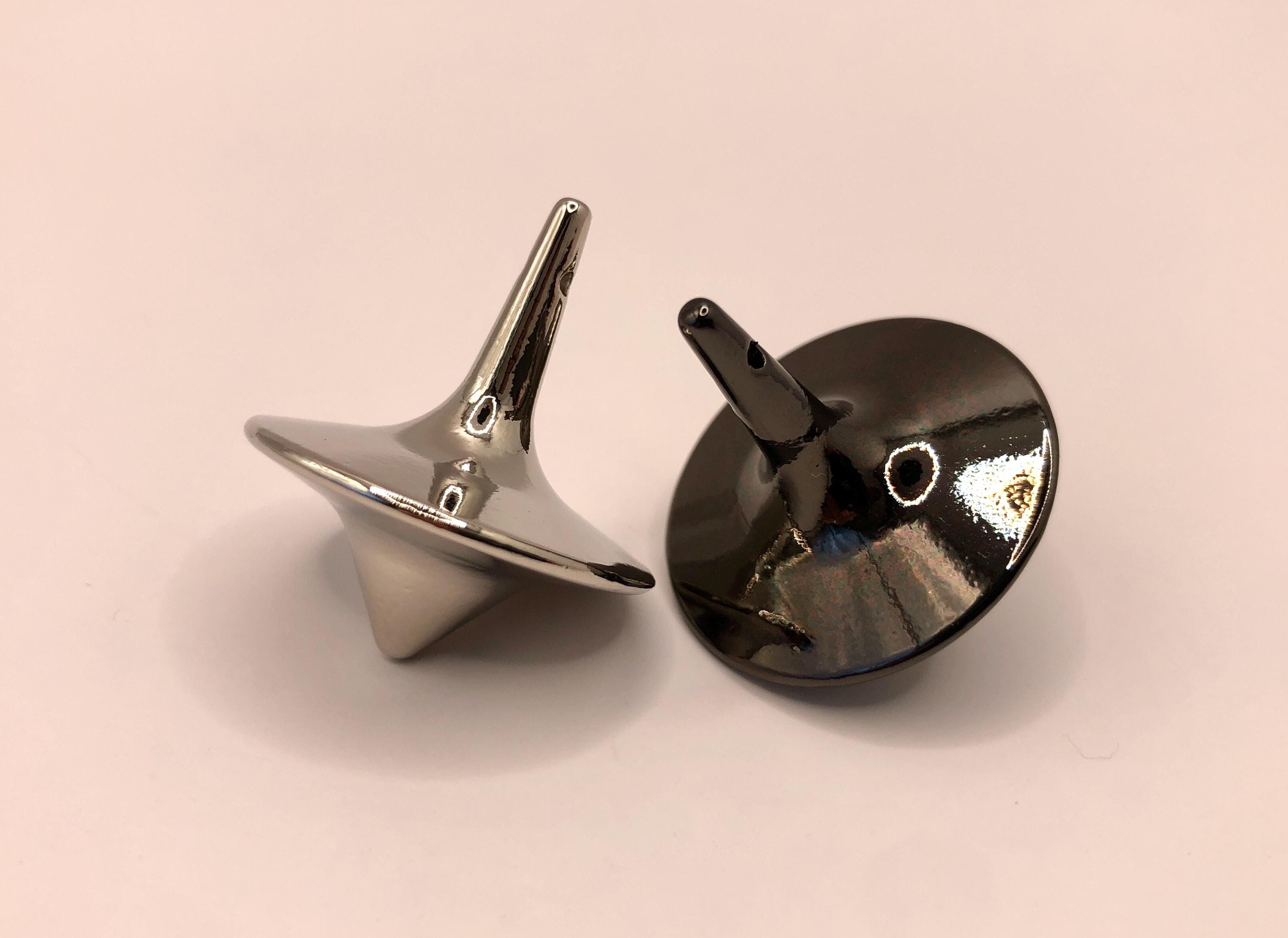 Inception themed spinning tops