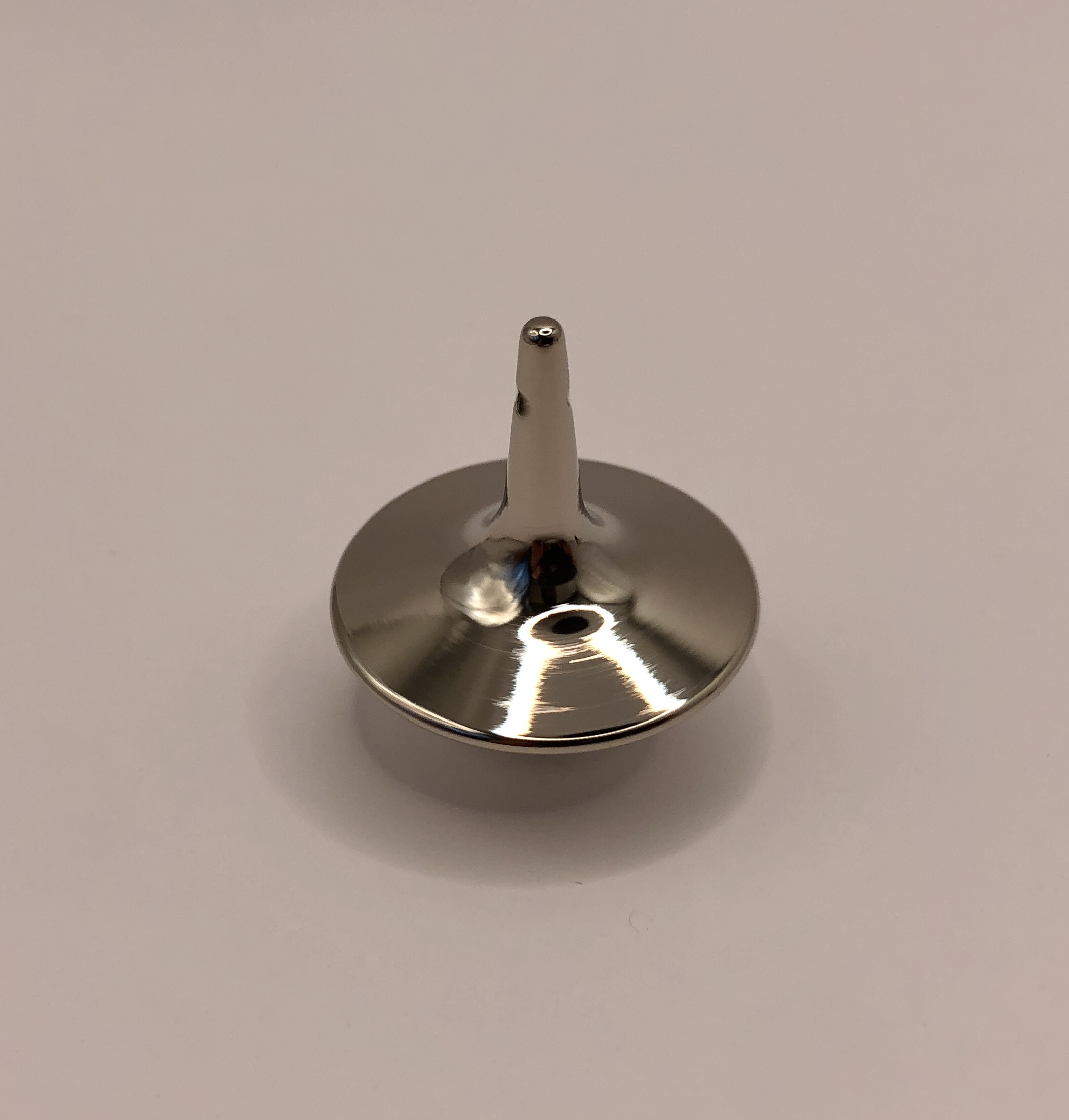 Inception themed spinning tops